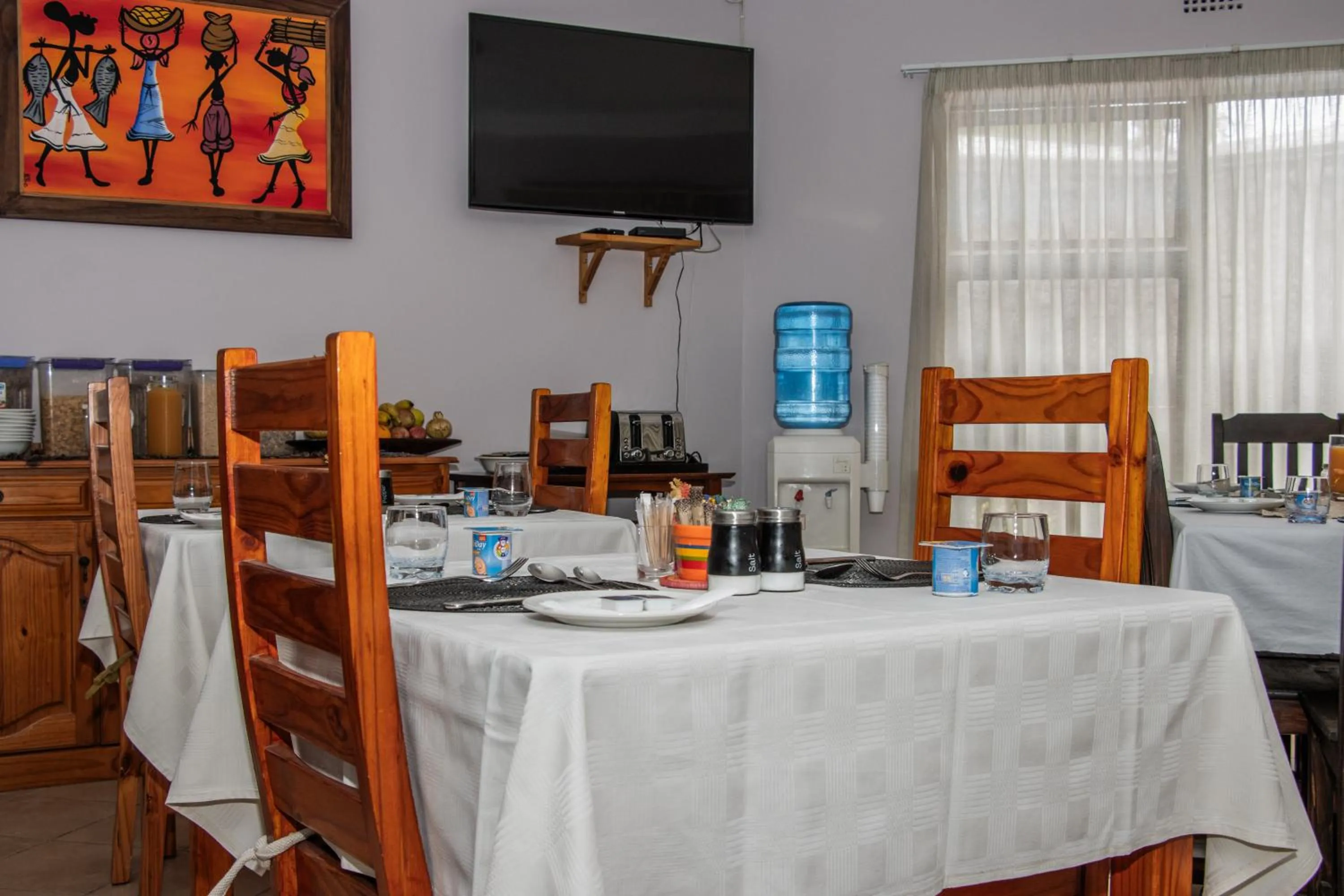 Bed in Woodpecker's Inn Guest House