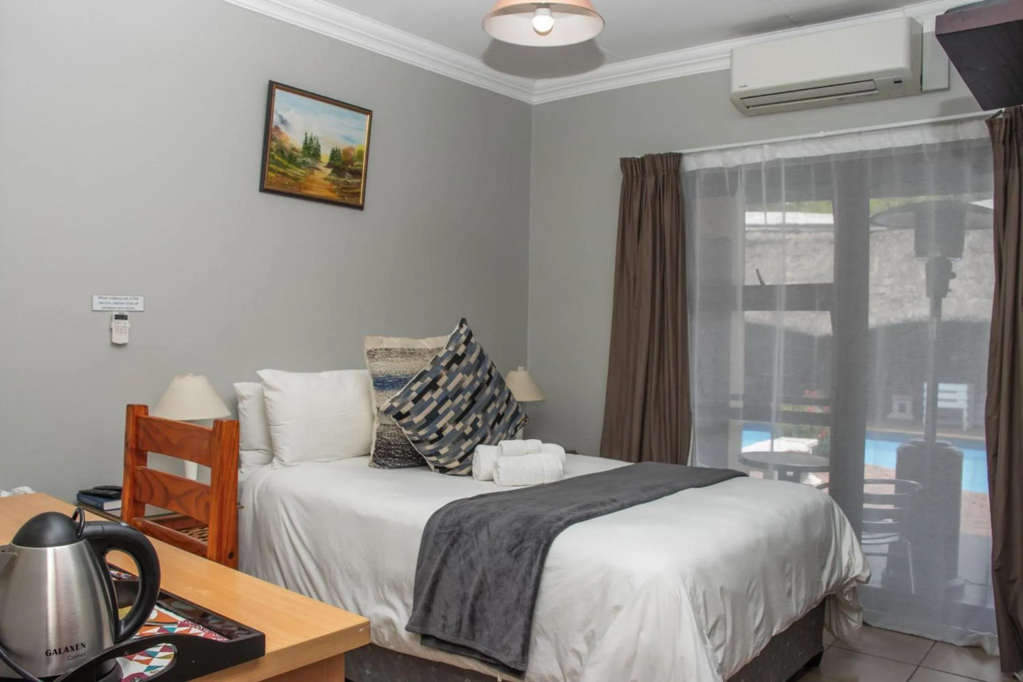 Bedroom in Woodpecker's Inn Guest House