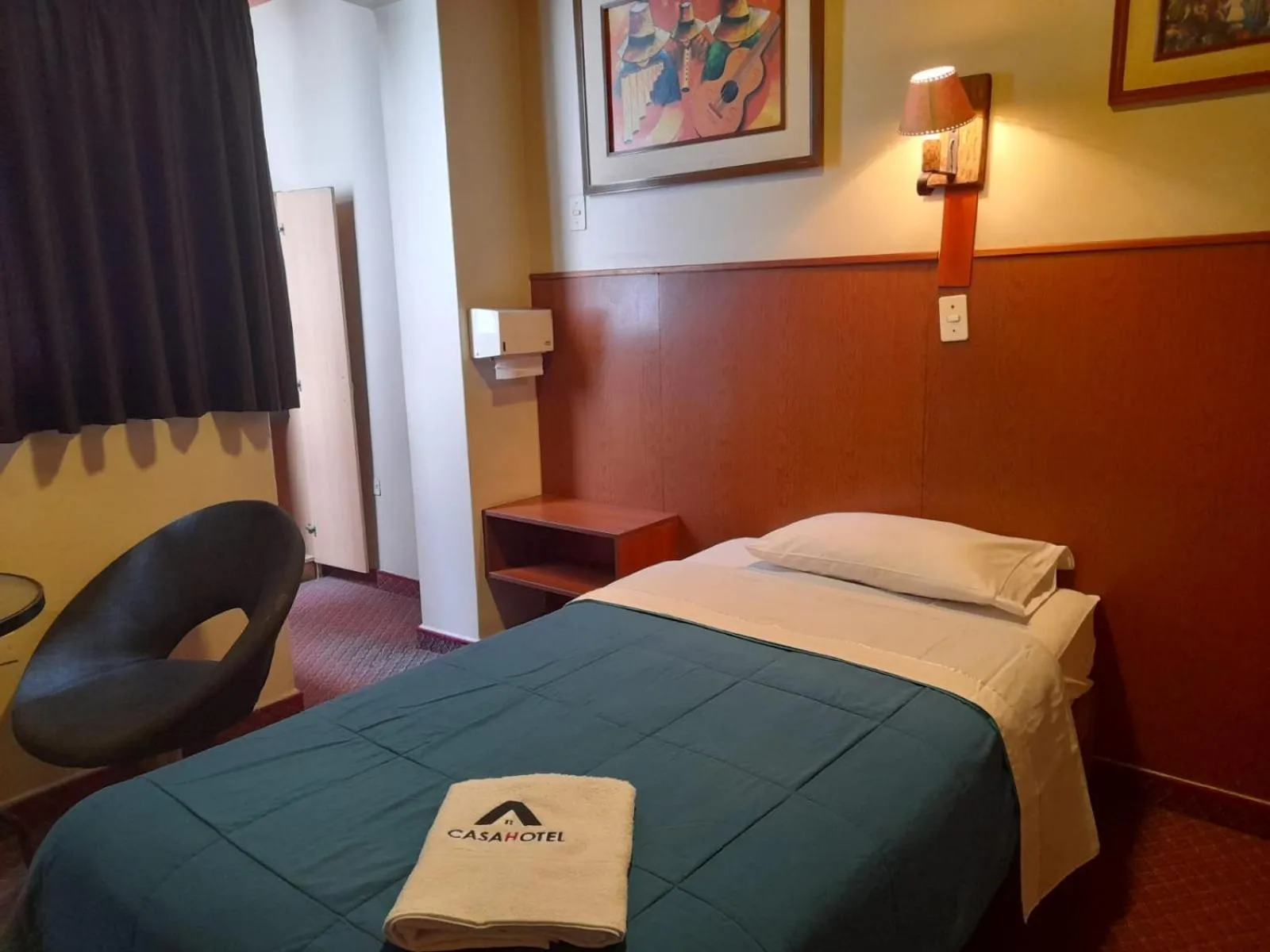 Bed in CasaHotel Jockey Plaza Mall