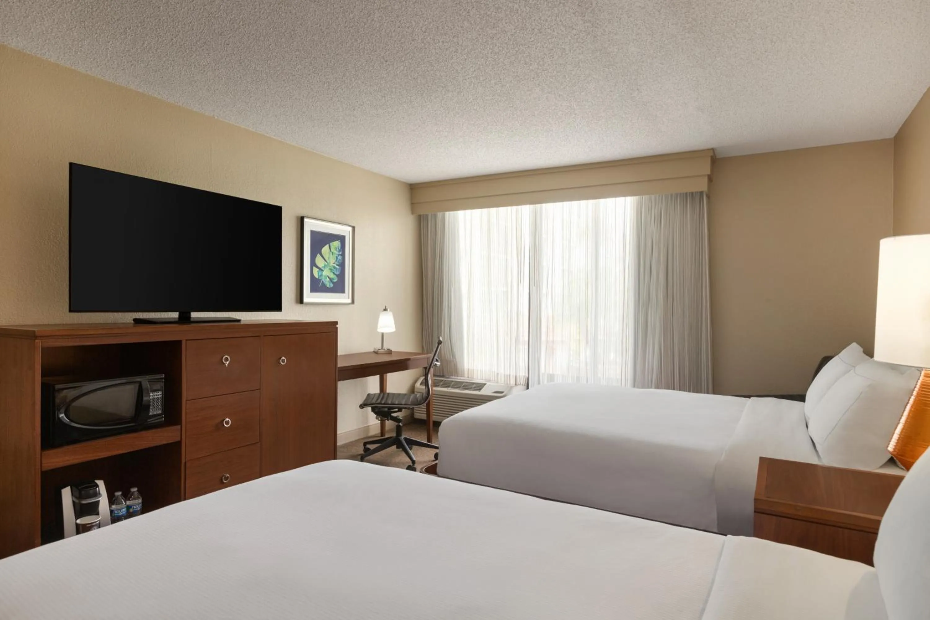 Bedroom, Bed in Crowne Plaza Hotel Fort Myers at Bell Tower Shops, an IHG Hotel