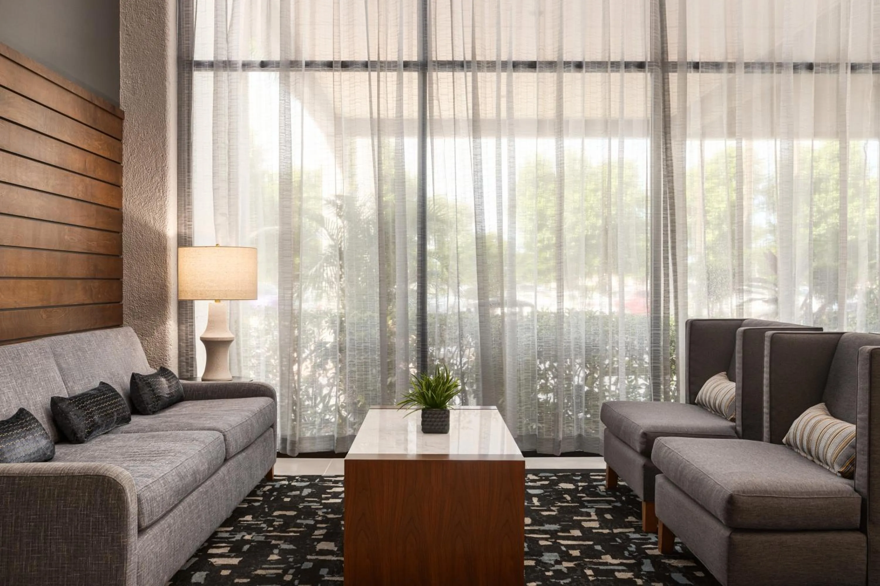 Lobby or reception in Crowne Plaza Hotel Fort Myers at Bell Tower Shops, an IHG Hotel