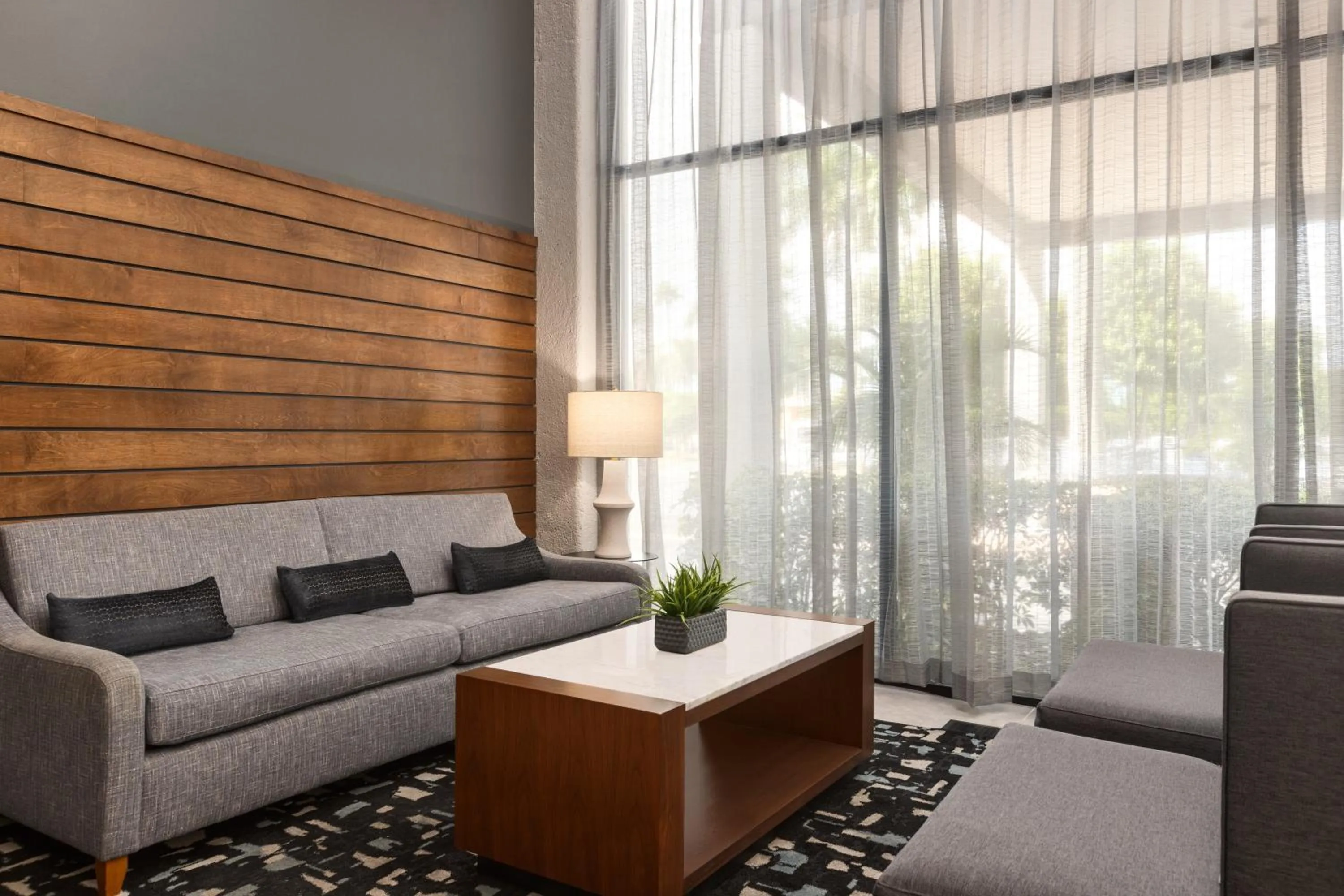 Seating area in Crowne Plaza Hotel Fort Myers at Bell Tower Shops, an IHG Hotel