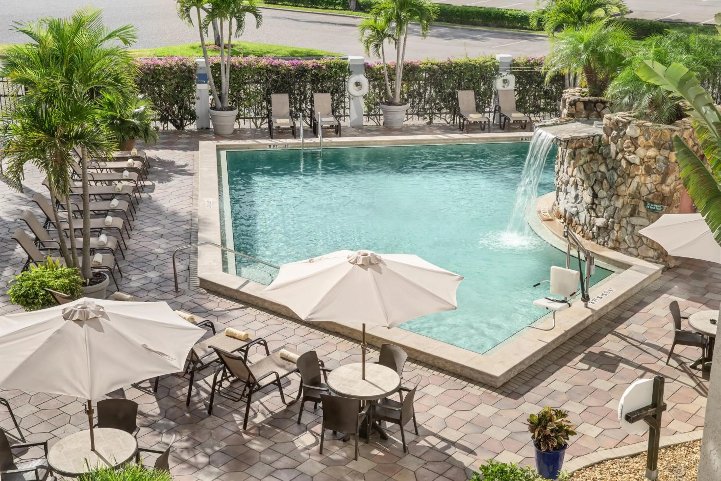 Swimming pool in Crowne Plaza Hotel Fort Myers at Bell Tower Shops, an IHG Hotel