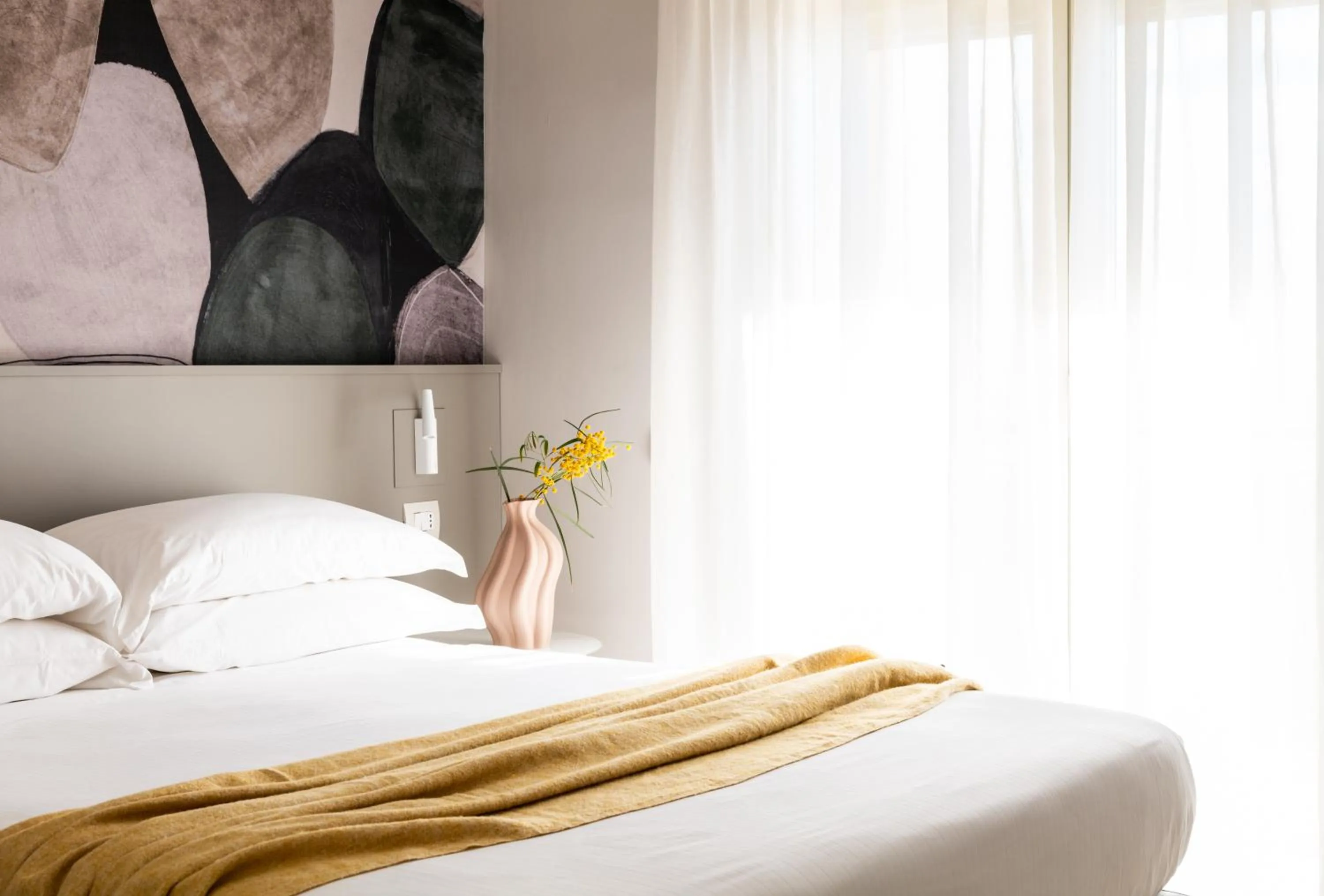 Bed in Luna Minoica Suites and Apartments