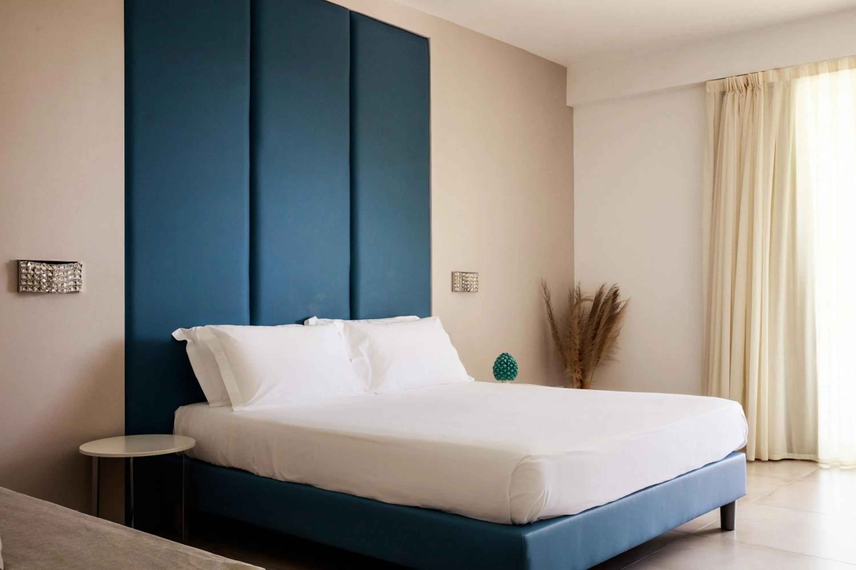 Bed in Luna Minoica Suites and Apartments