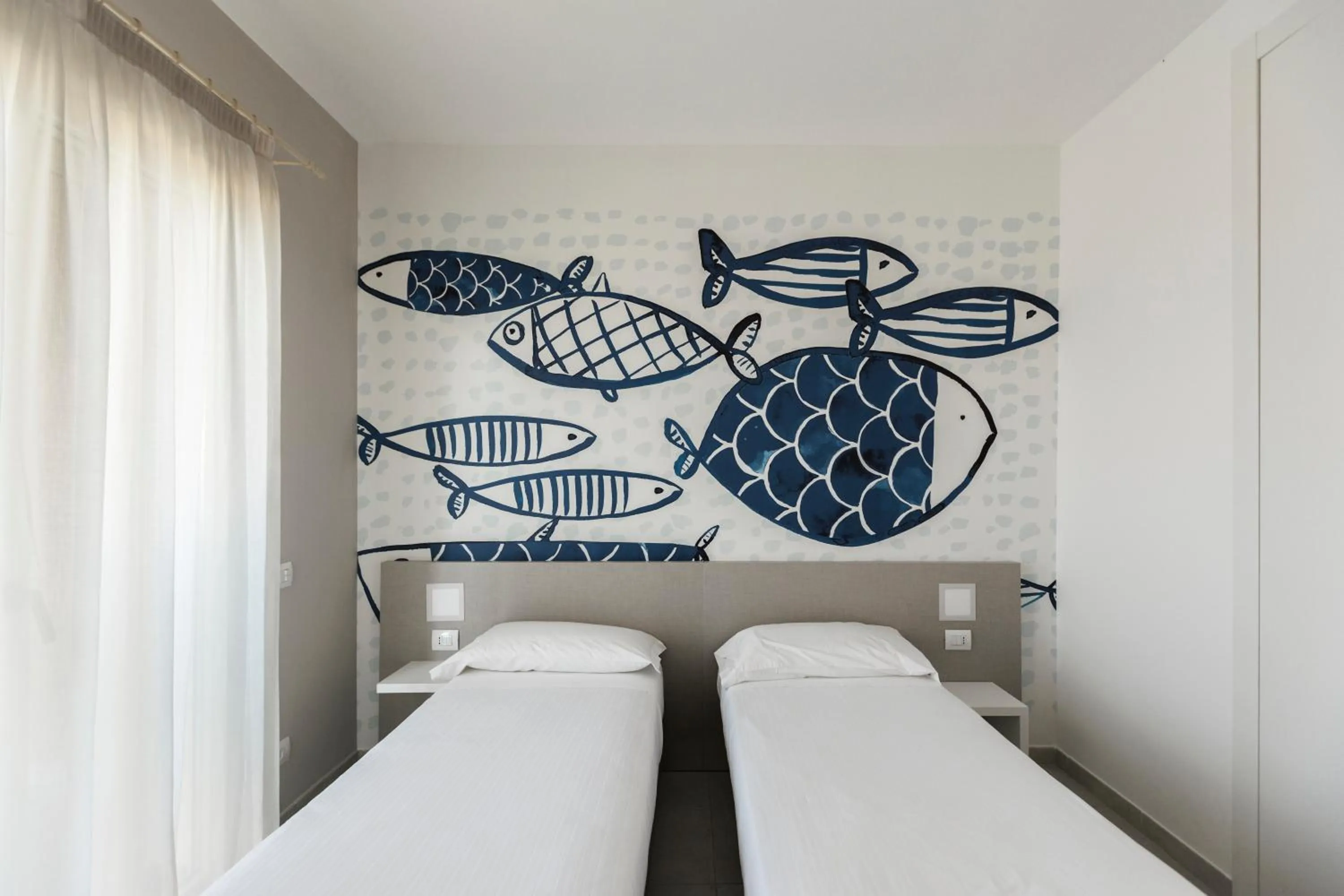 Bed in Luna Minoica Suites and Apartments