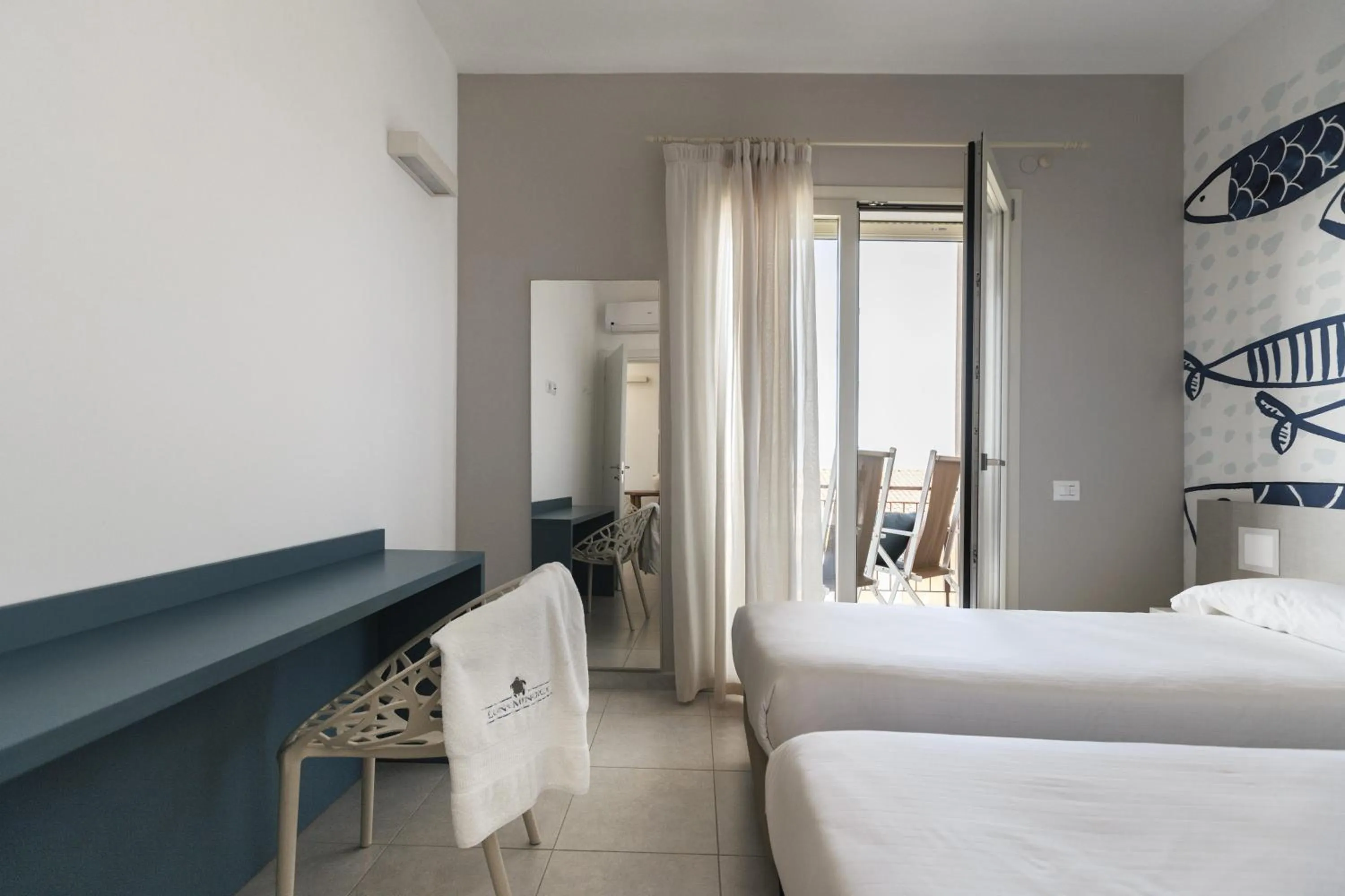 Bed in Luna Minoica Suites and Apartments