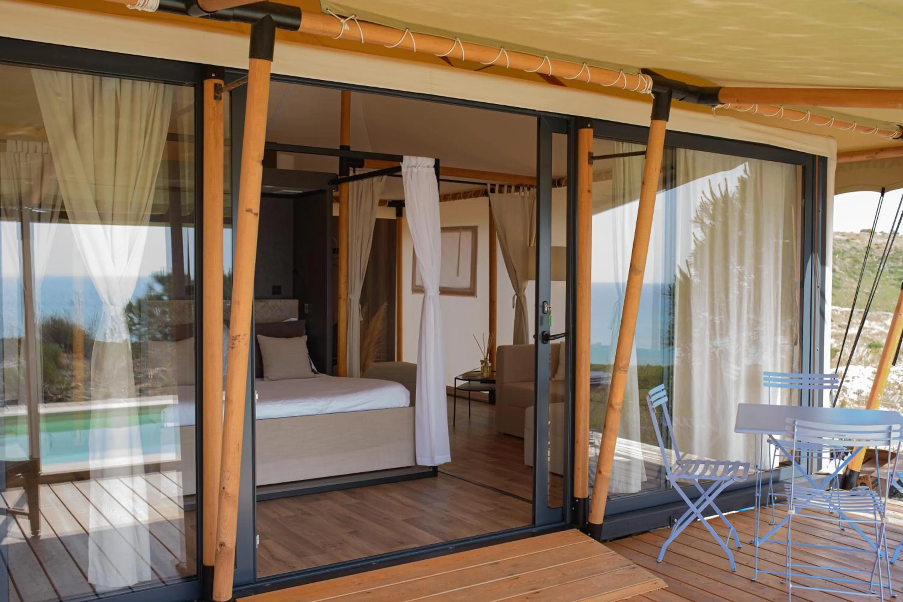 Patio, Bed in Luna Minoica Suites and Apartments