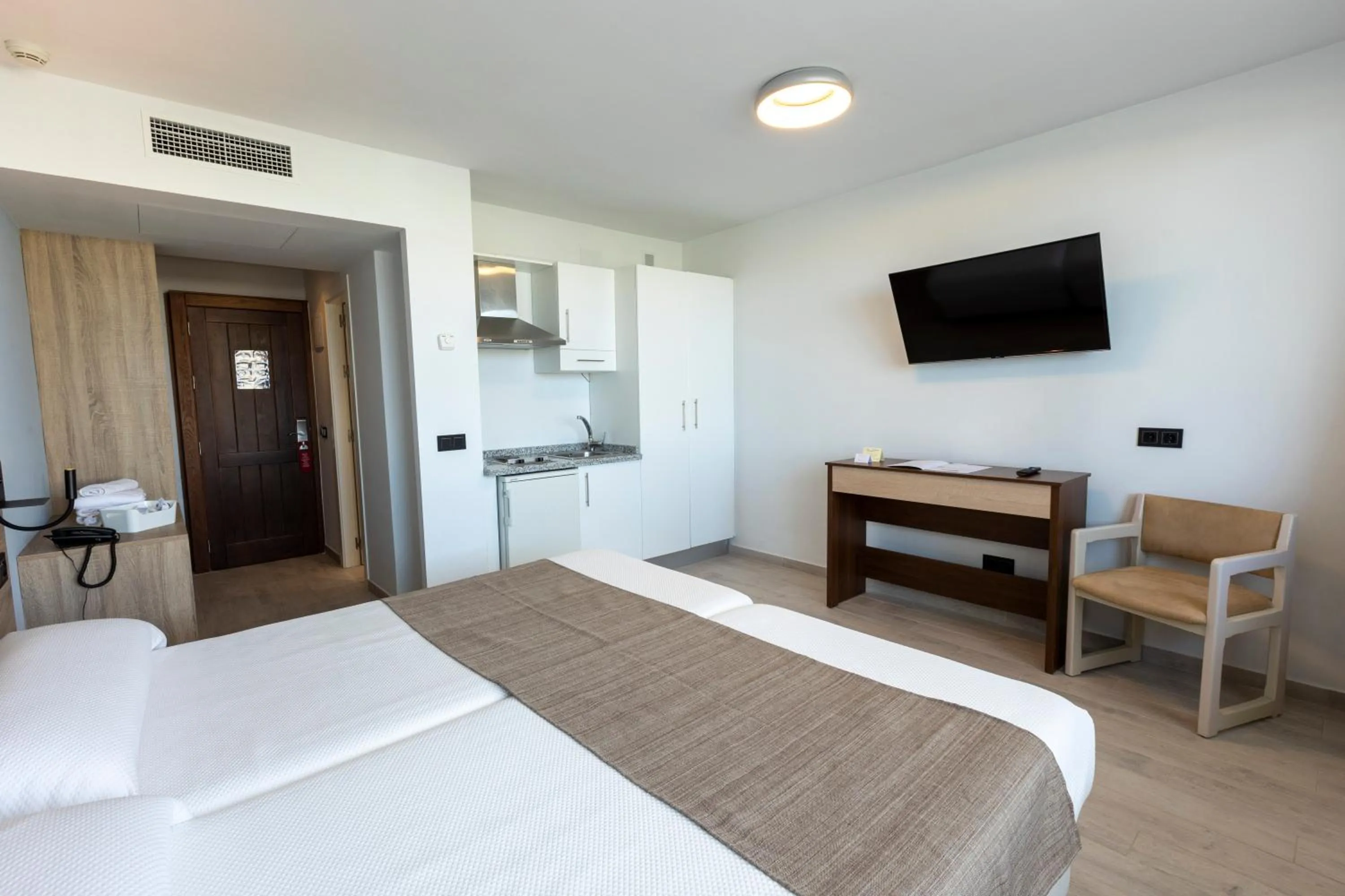 Bed in Hotel Flamero