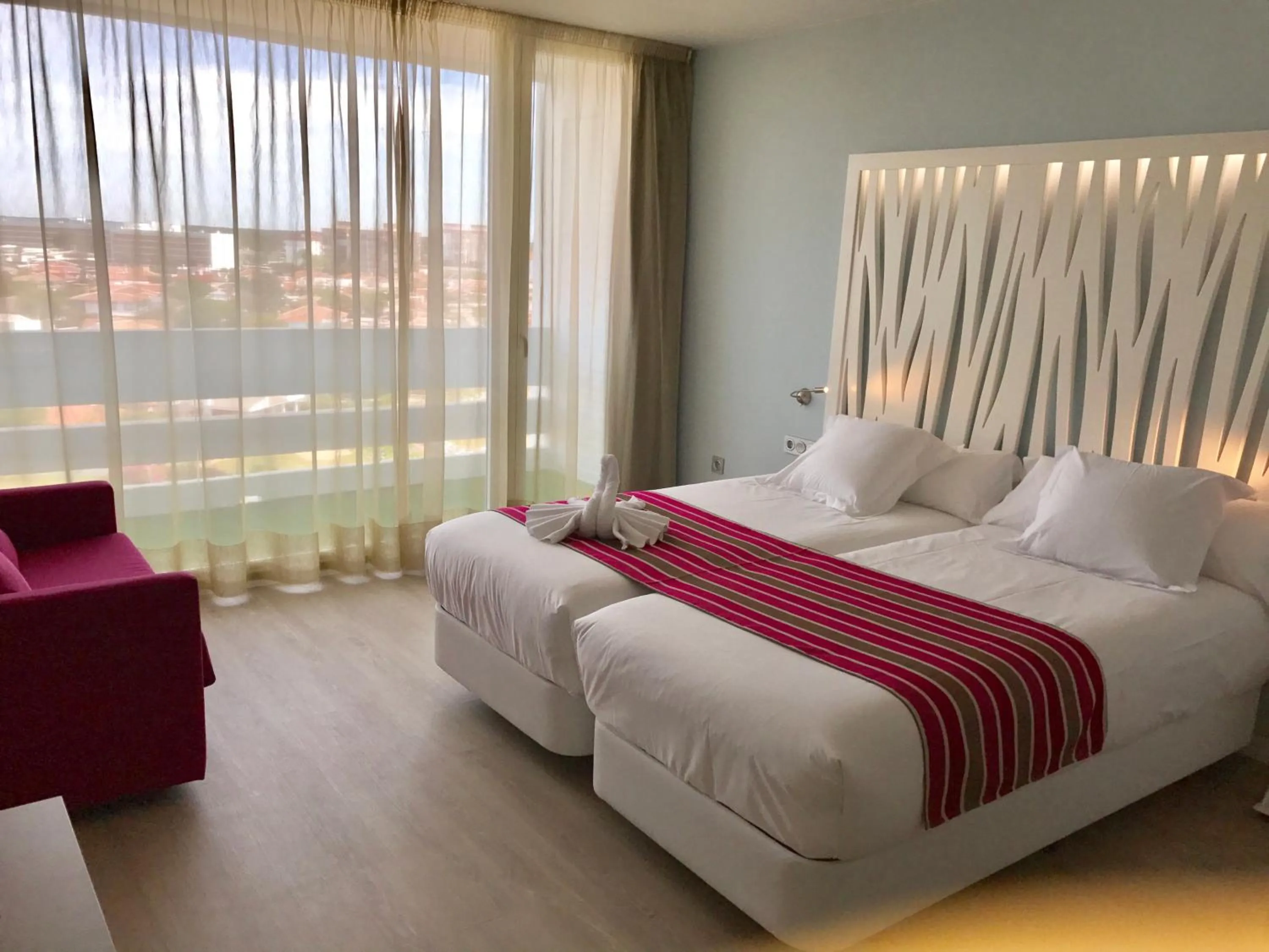 Bed in Hotel Flamero