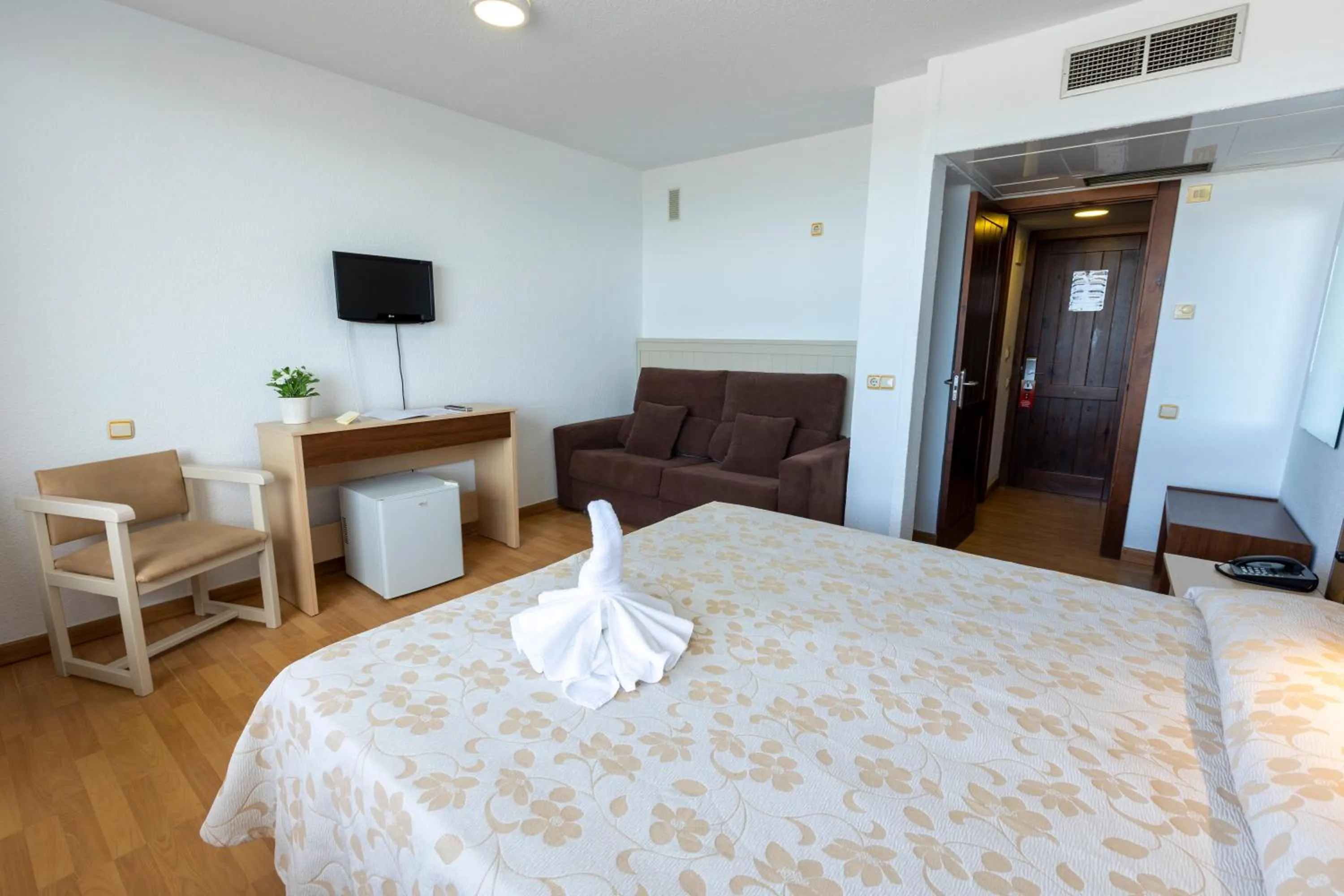 Bed in Hotel Flamero