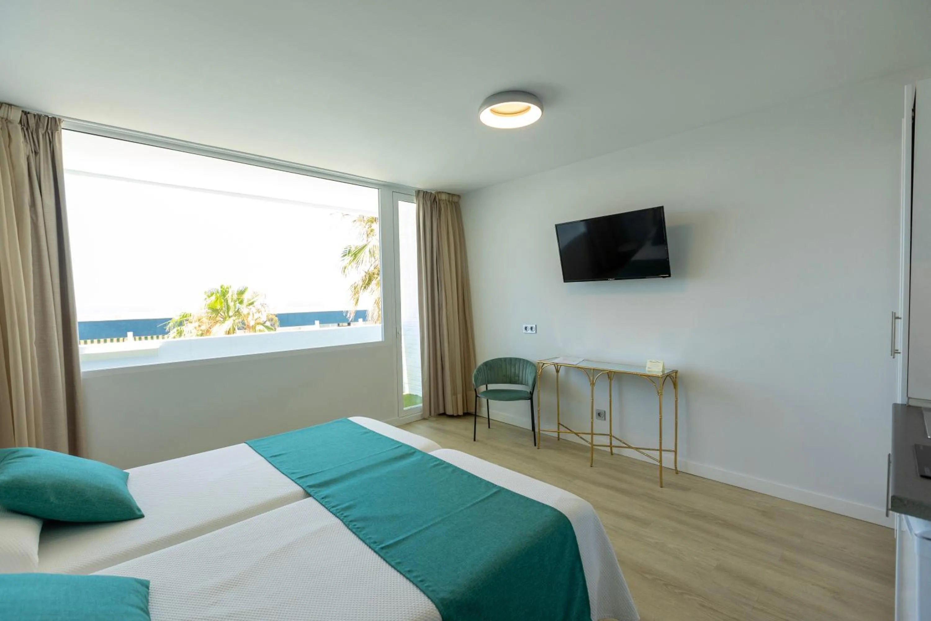 Bed in Hotel Flamero