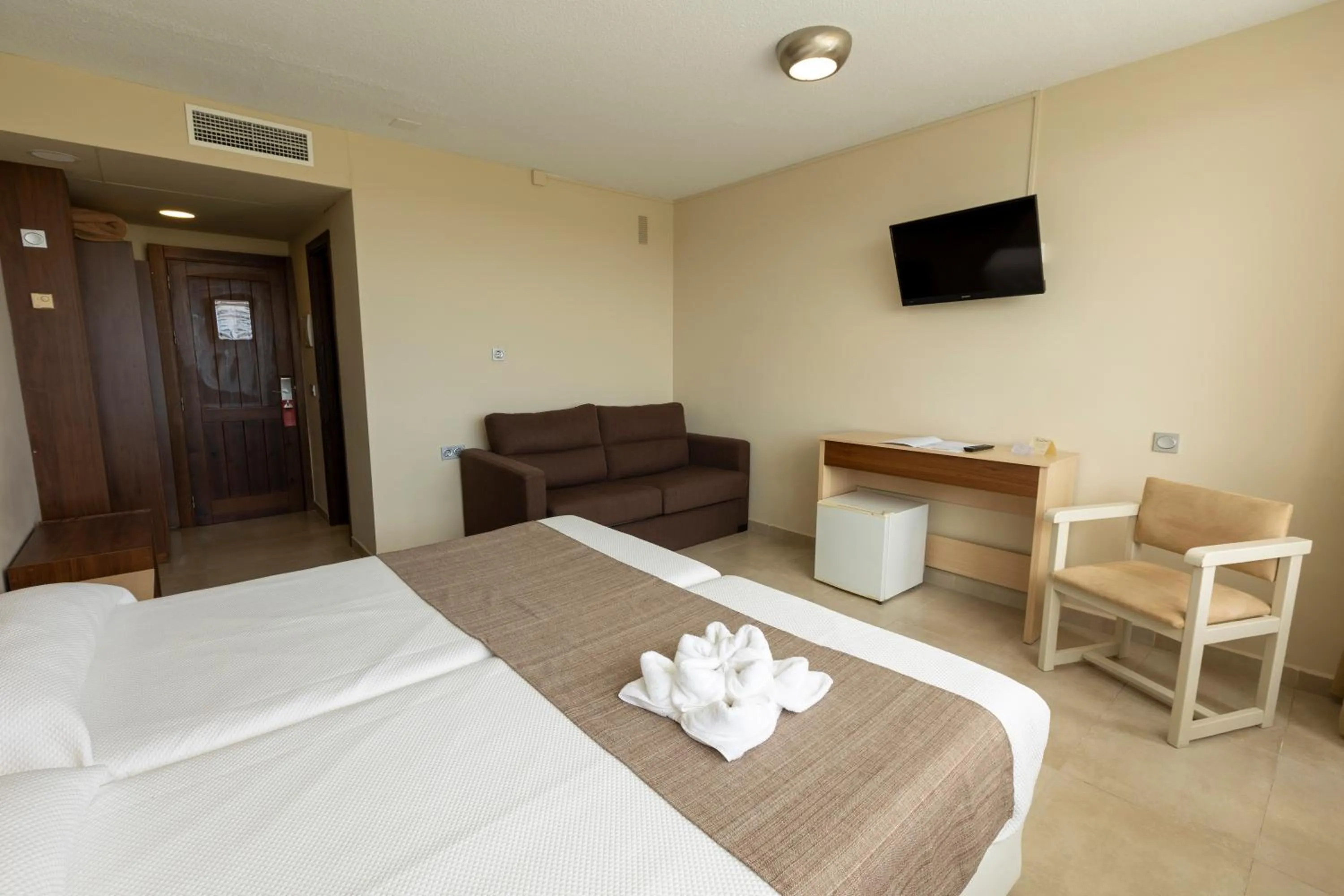 Bed in Hotel Flamero