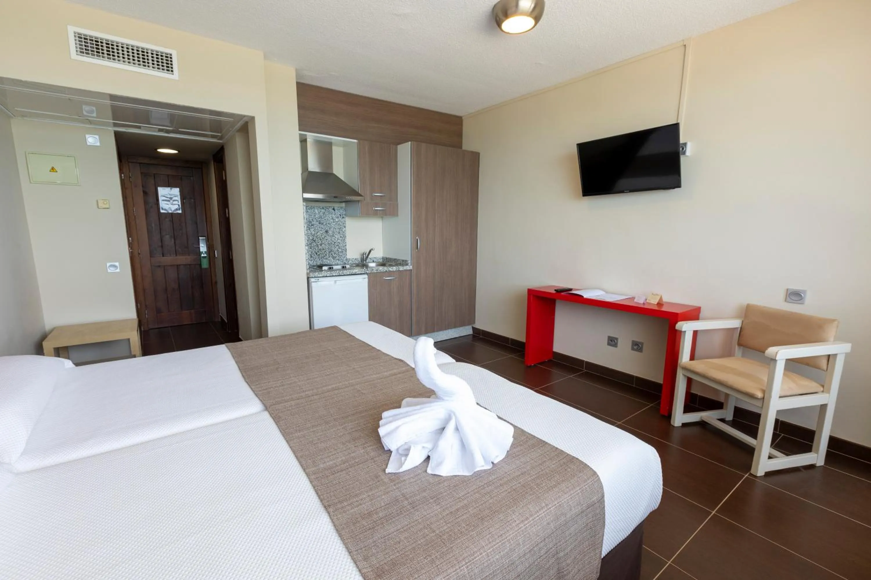 Bed in Hotel Flamero