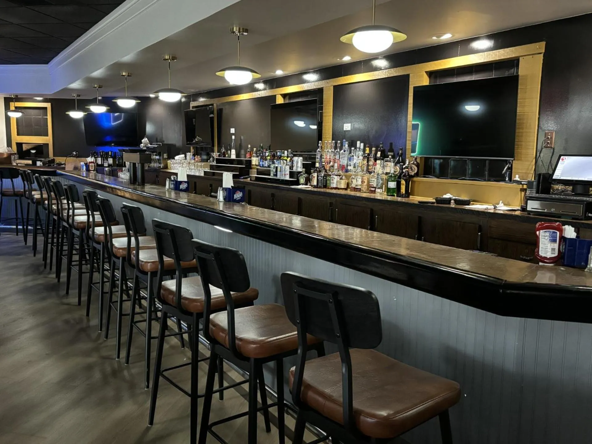 Lounge or bar in The Lux Hotel & Conference Center, an Ascend Collection Hotel