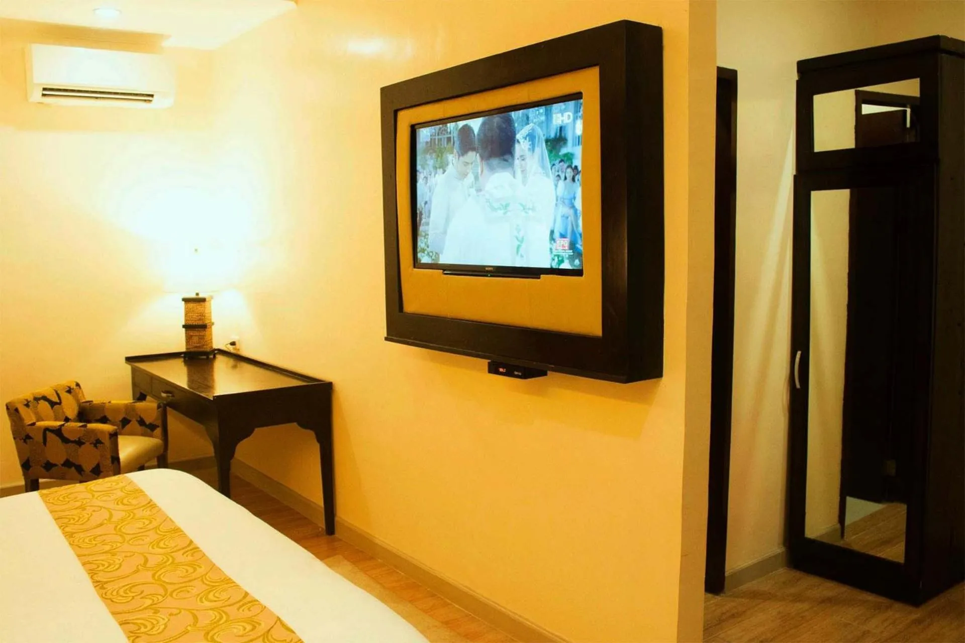 TV/Entertainment Center in Palm Grass Hotel