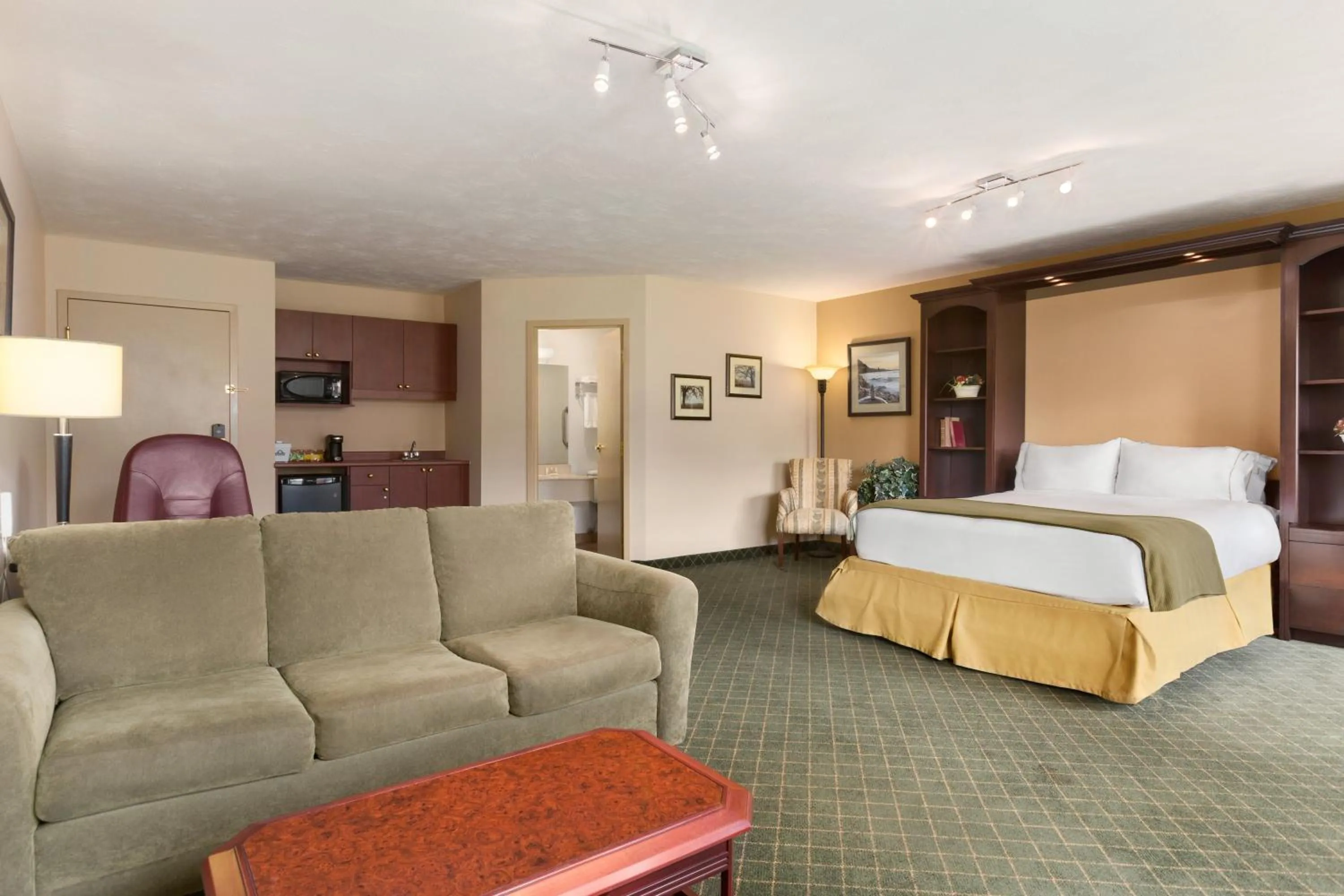 Living room, Bed in Days Inn & Suites by Wyndham Moncton