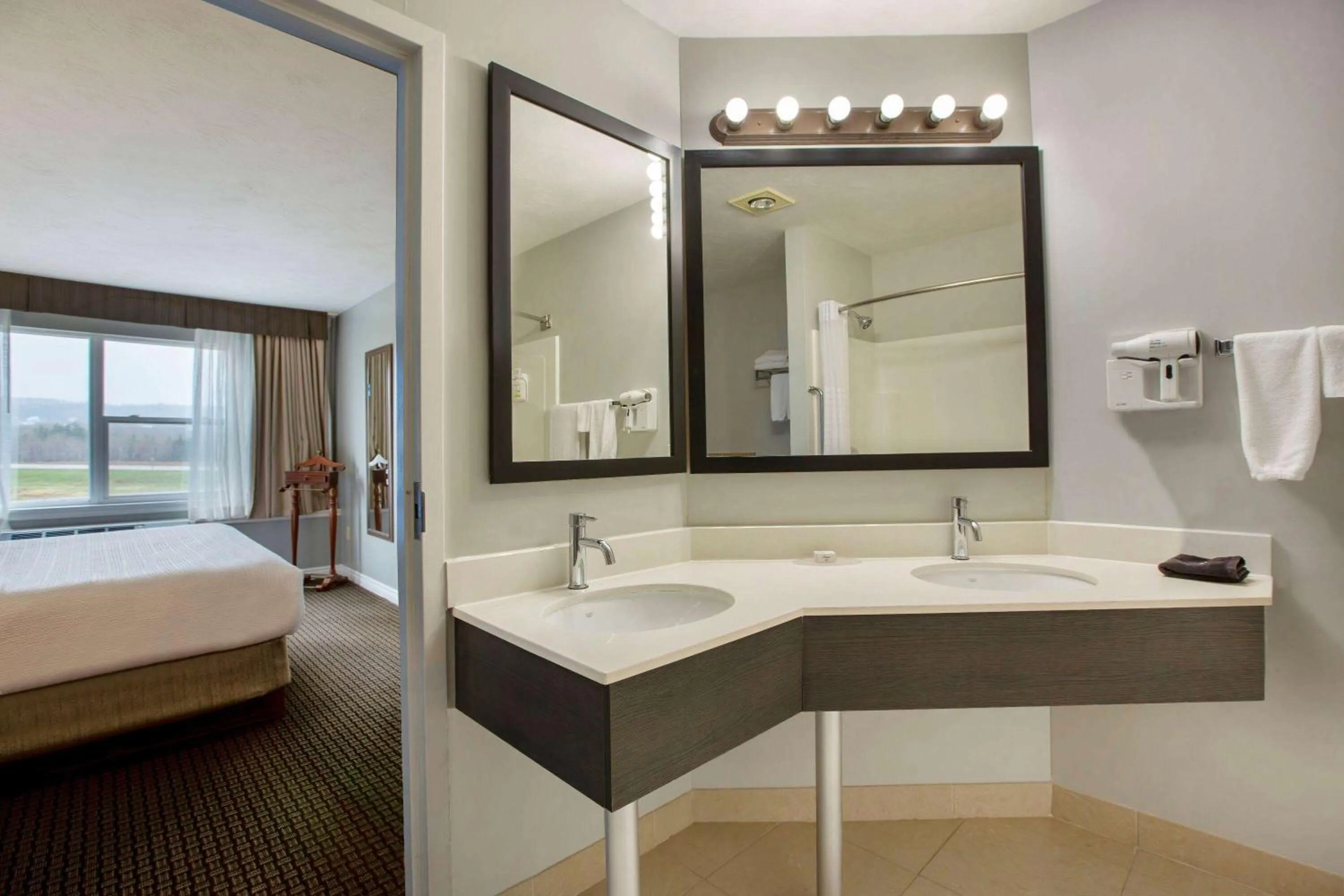 Photo of the whole room, Bed in Days Inn & Suites by Wyndham Moncton