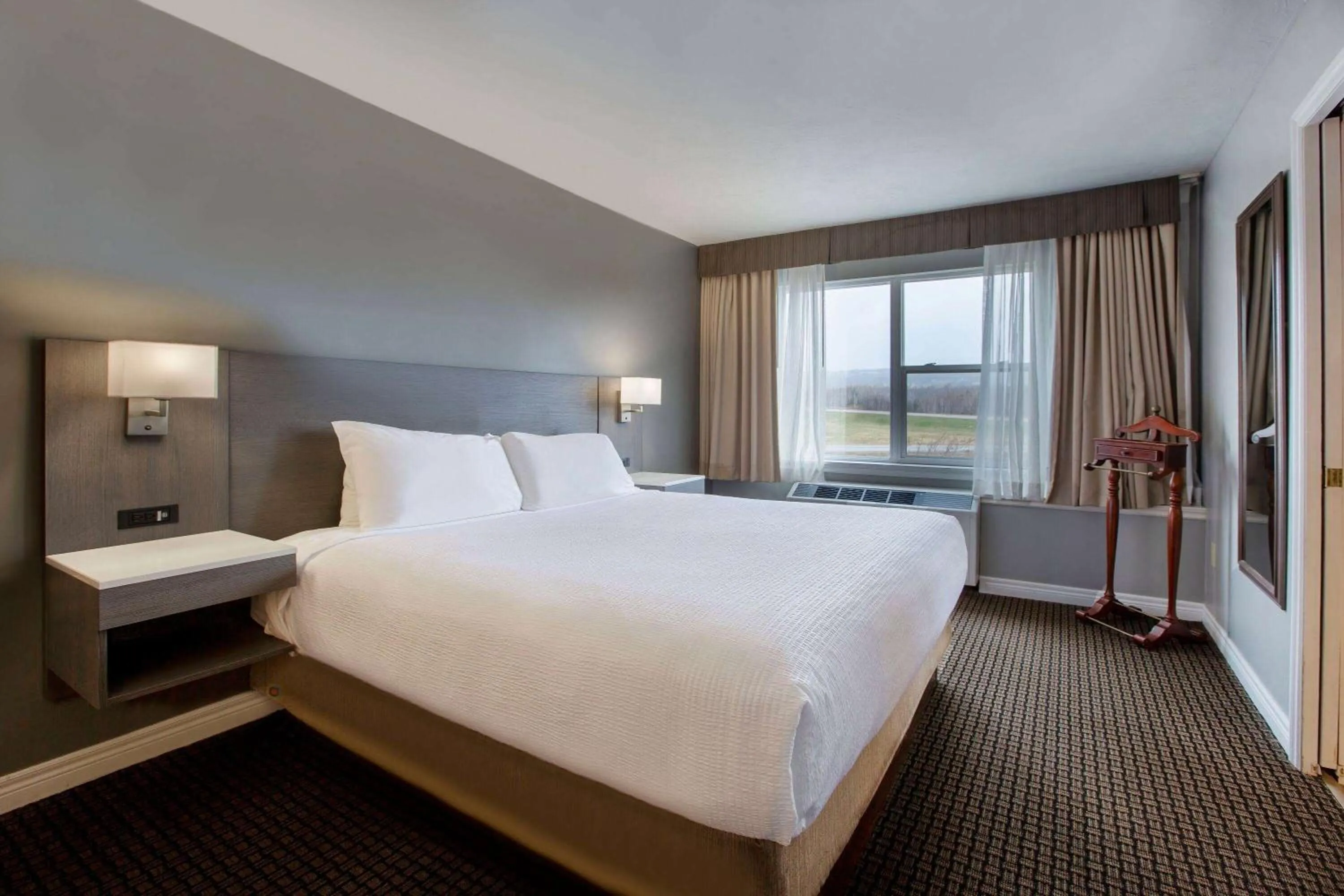 Photo of the whole room, Bed in Days Inn & Suites by Wyndham Moncton