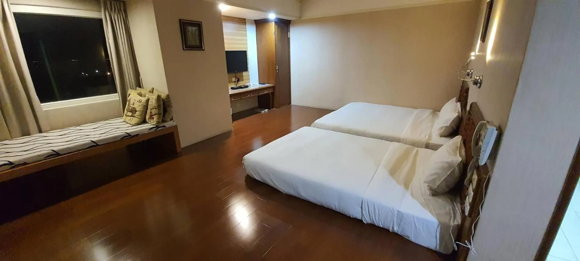 Bed in Tapeng Bay Holiday Hotel