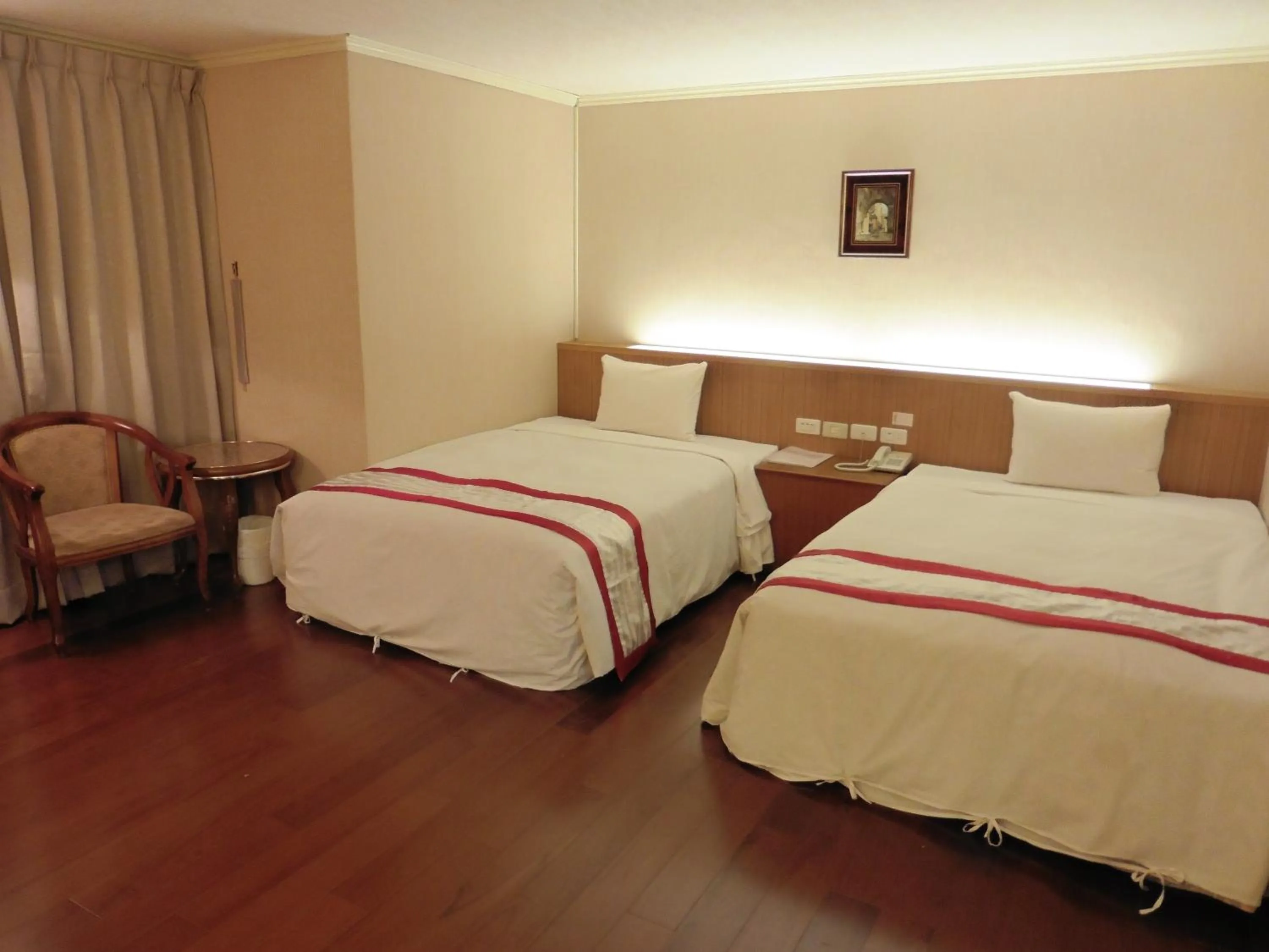 Bed in Tapeng Bay Holiday Hotel