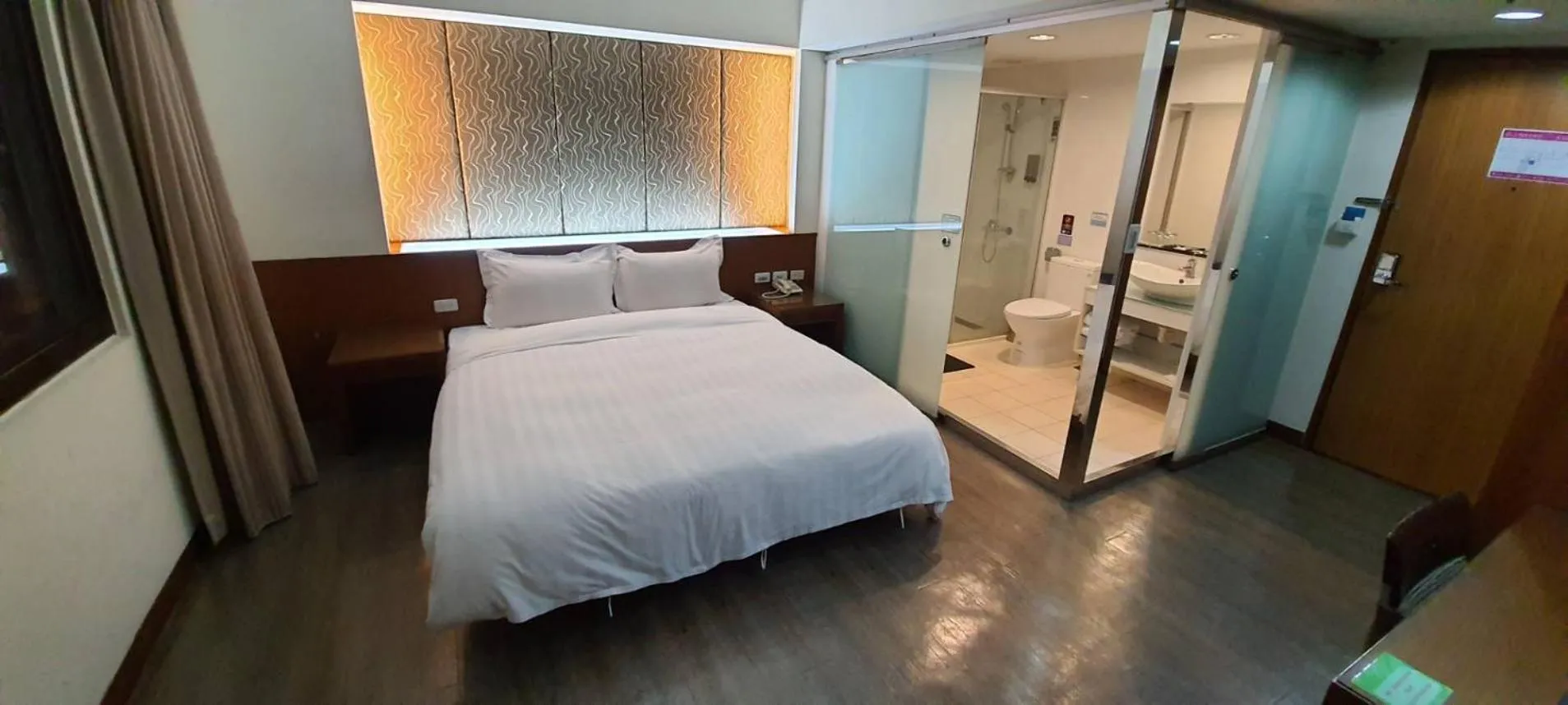 Bed in Tapeng Bay Holiday Hotel