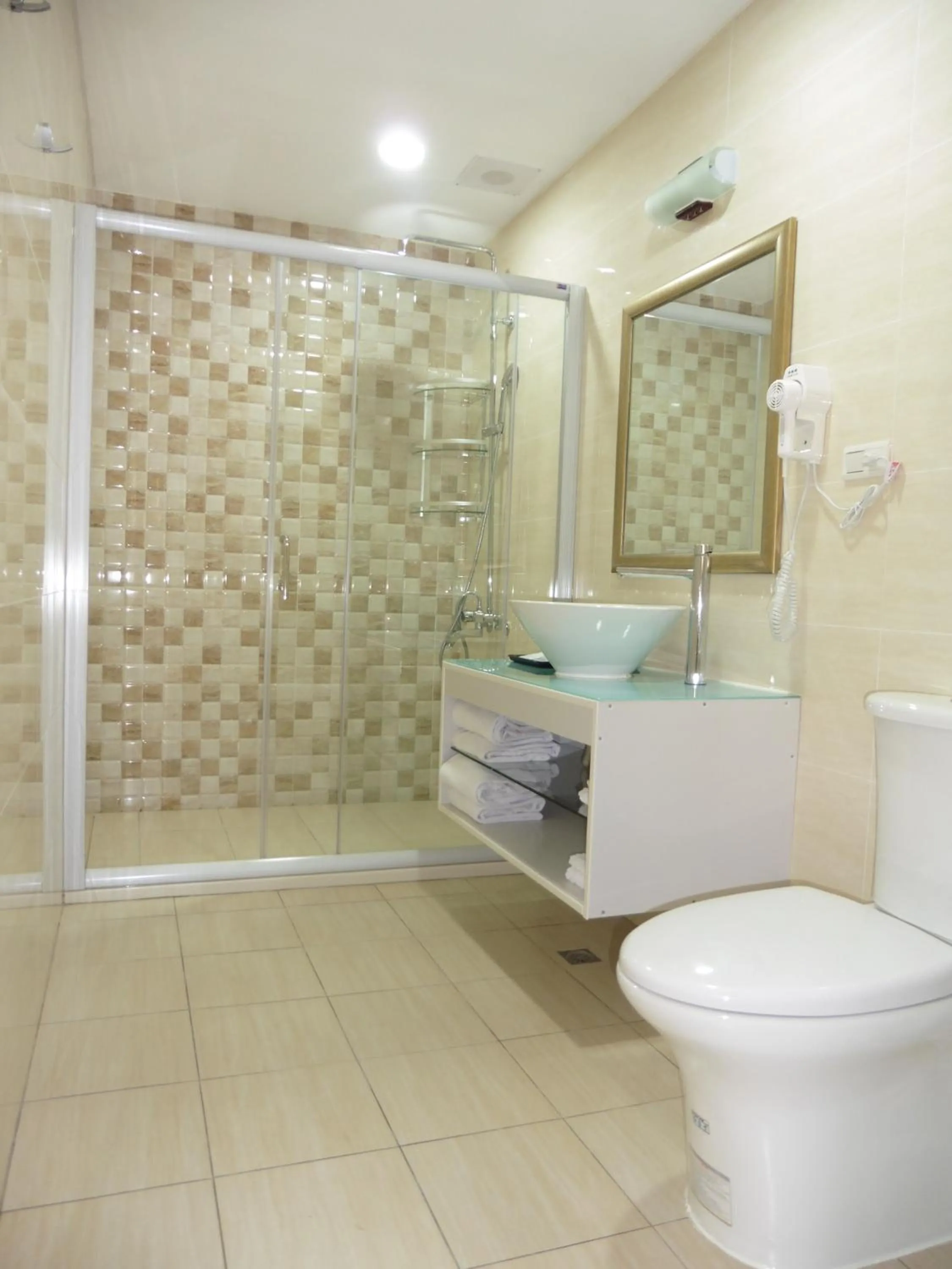Bathroom in Tapeng Bay Holiday Hotel