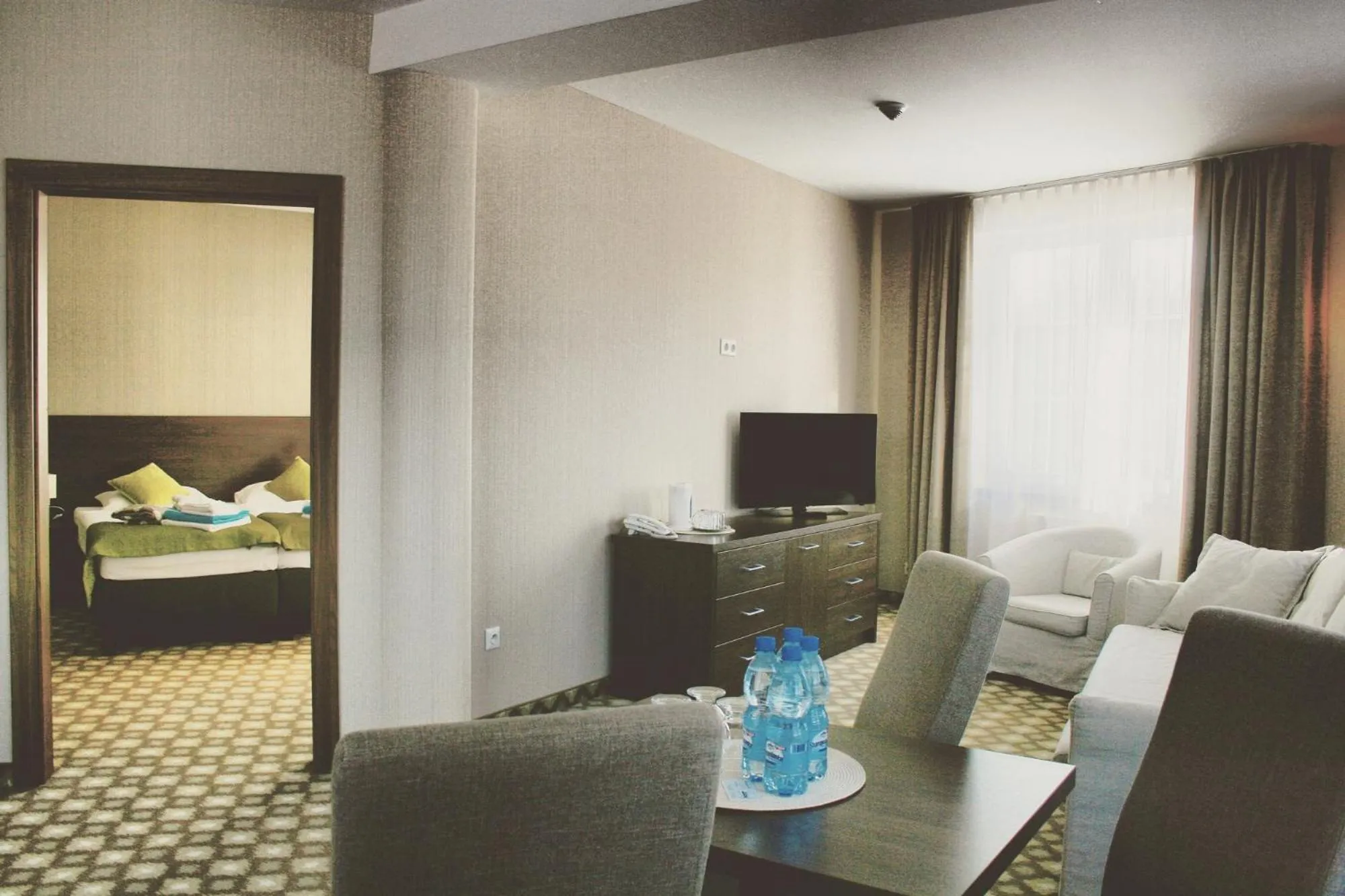 Seating area, Bed in Hotel Nowy Zdrój - Centrum Zdrowia i Wypoczynku