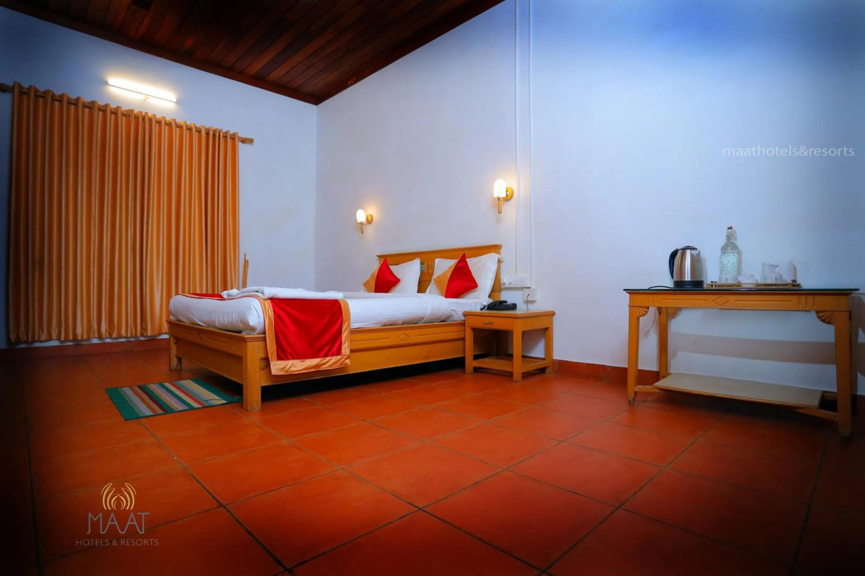 Bed in Dew Drops Farm Resorts