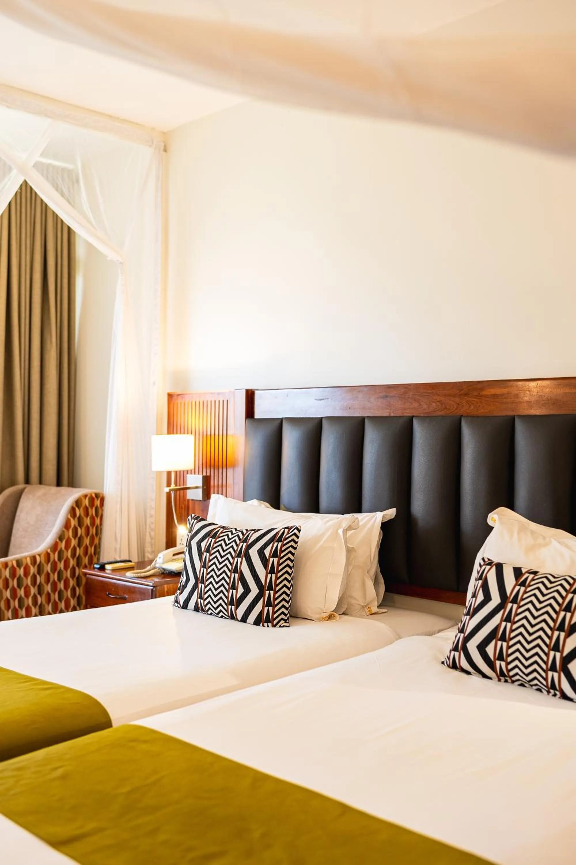 Bed in Victoria Falls Rainbow Hotel