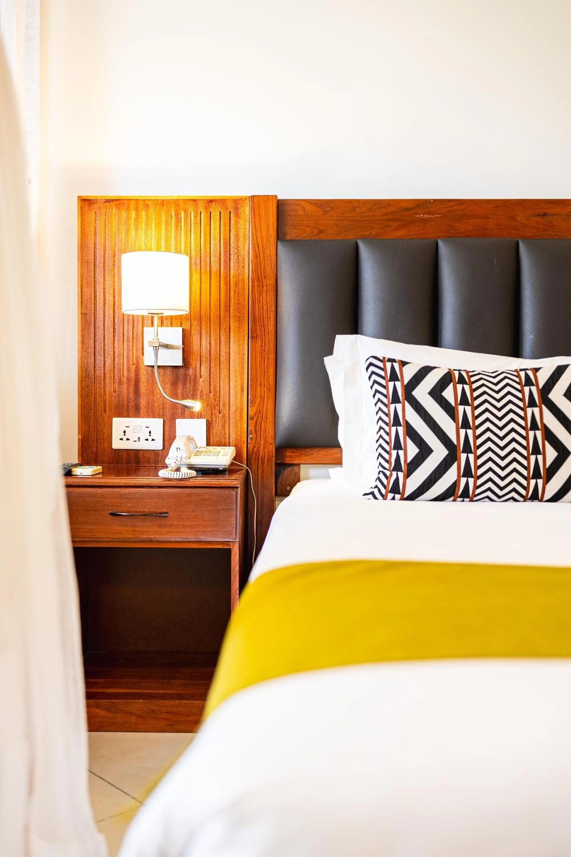 Bed in Victoria Falls Rainbow Hotel