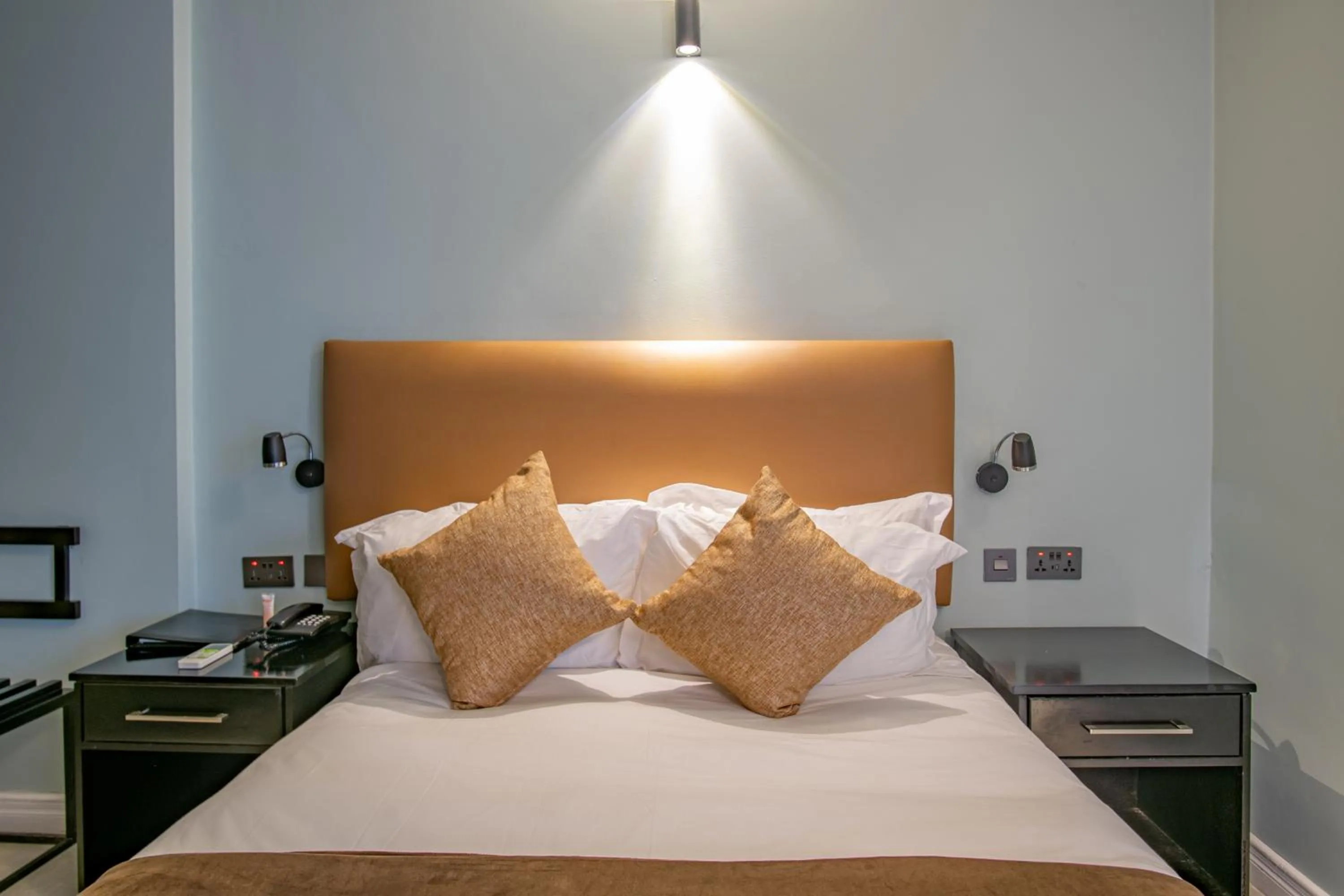 Bed in New Ambassador Hotel