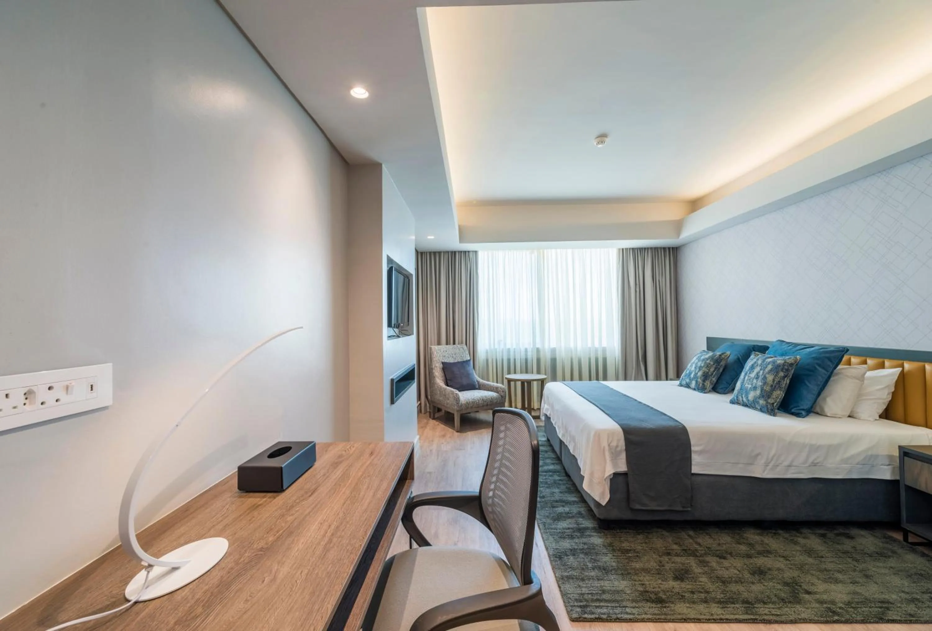 Bed in Rainbow Towers Hotel & Conference Centre