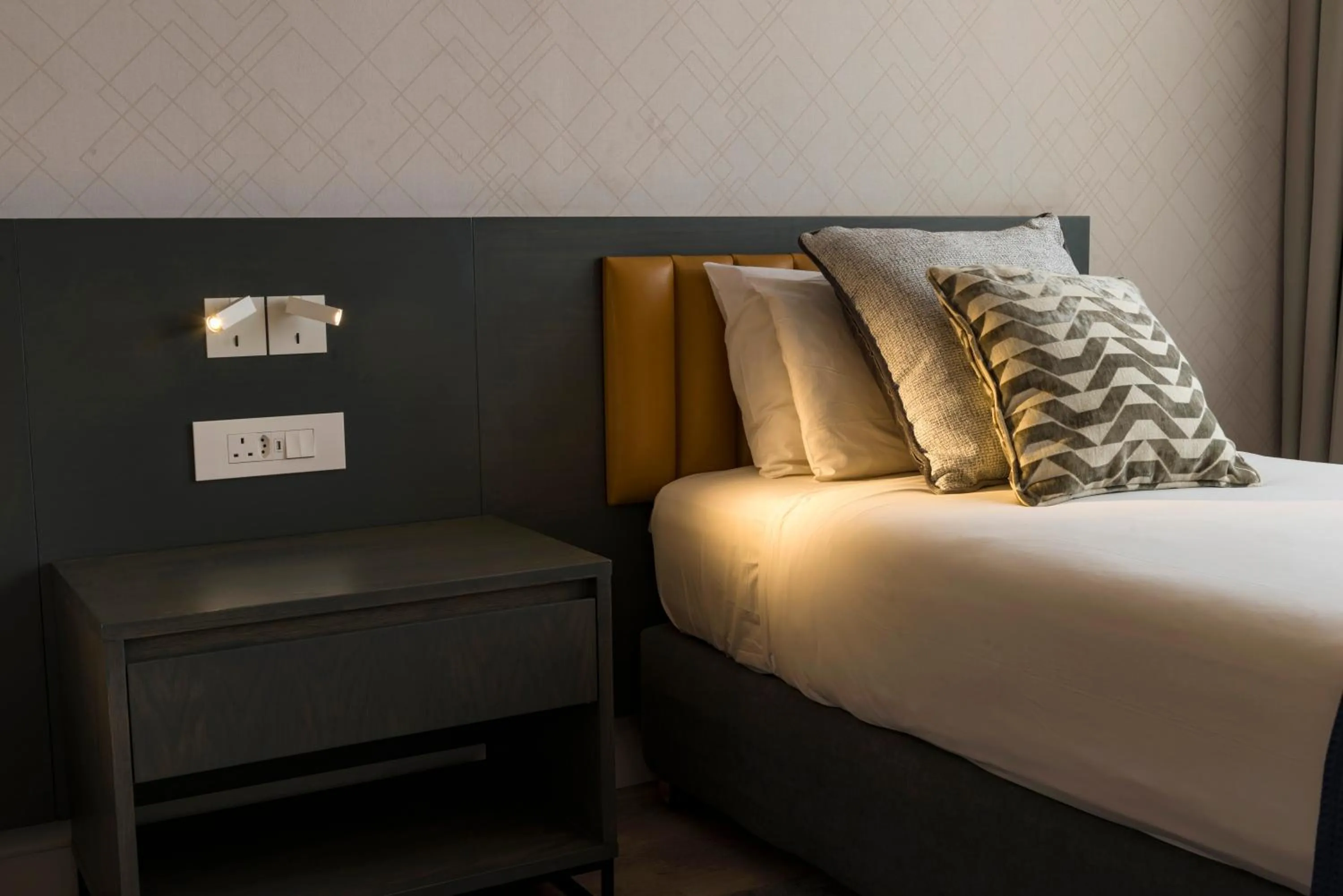 Bed in Rainbow Towers Hotel & Conference Centre