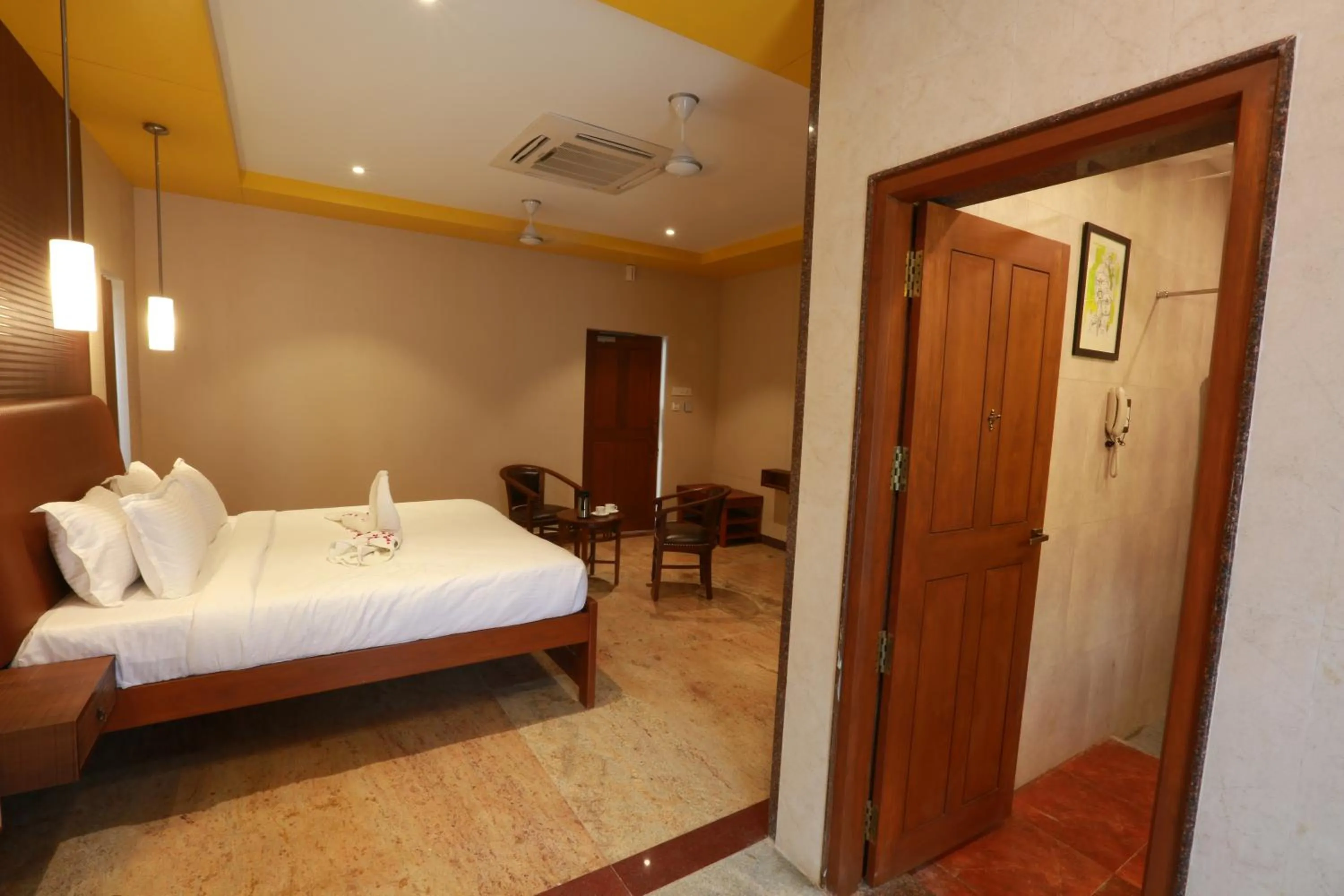 Seating area, Bed in Mayapuri Amira