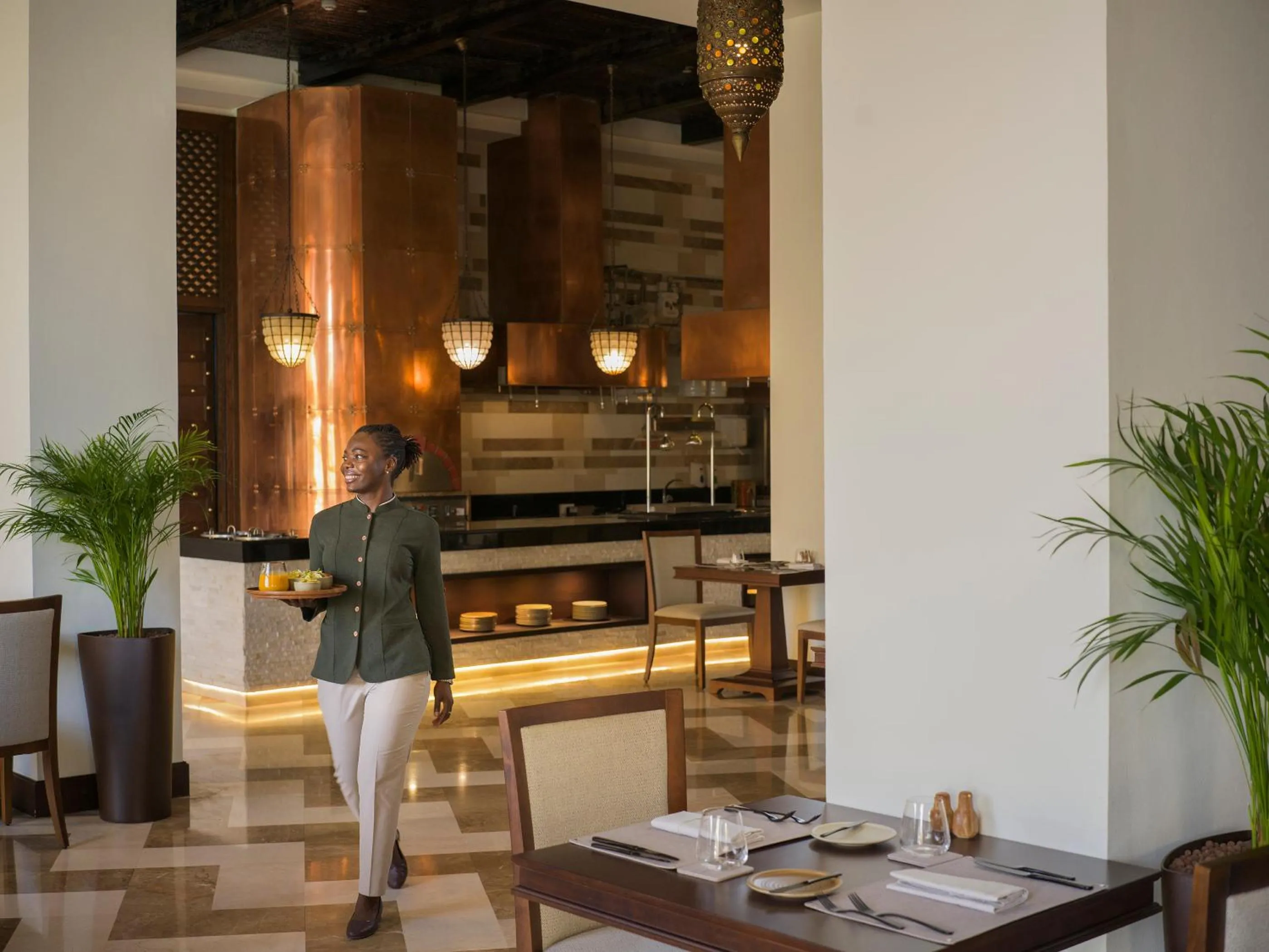 Restaurant/places to eat in Aldhafra Desert Resort, Vignette Collection by IHG