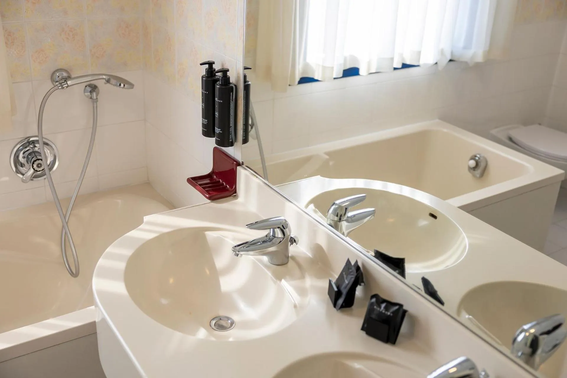 Bathroom in Hi Hotels Riva del Garda