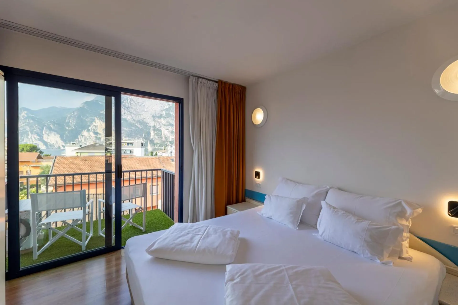 Balcony/Terrace, Bed in Hi Hotels Riva del Garda