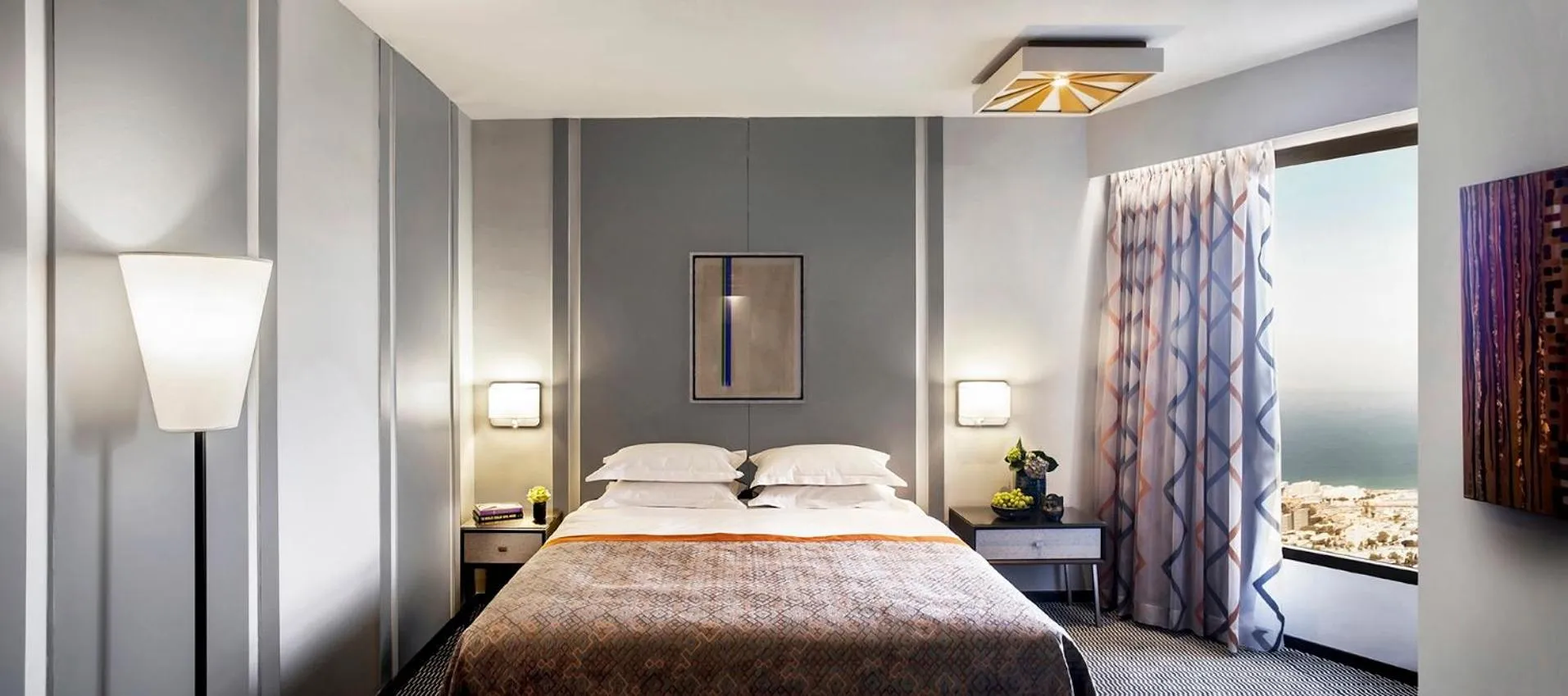 Bed in Dan Panorama Haifa Hotel