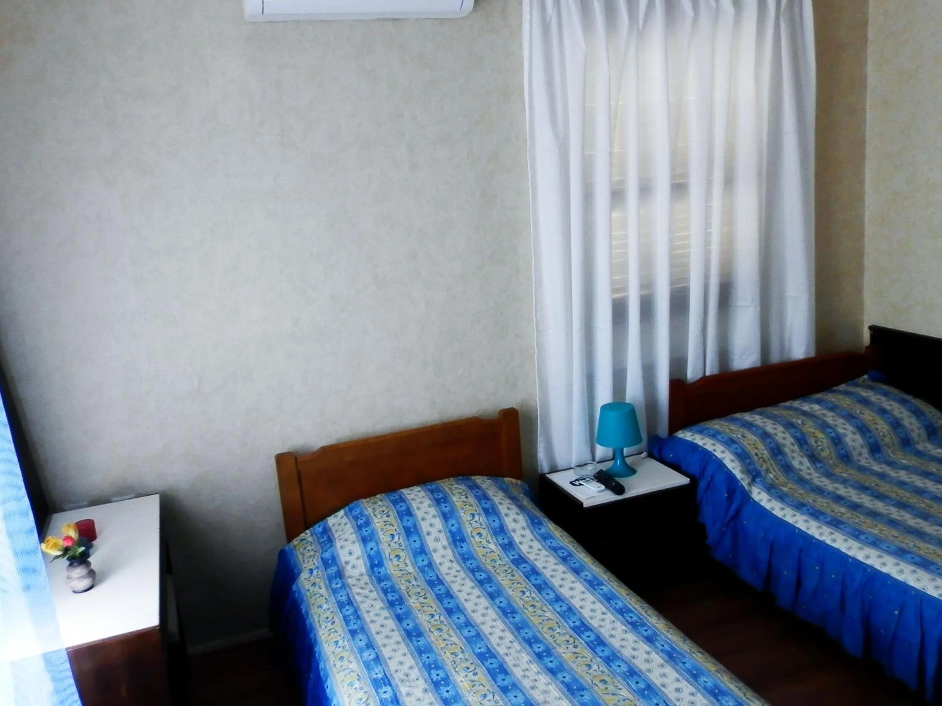 Bed in Akanthos Hotel