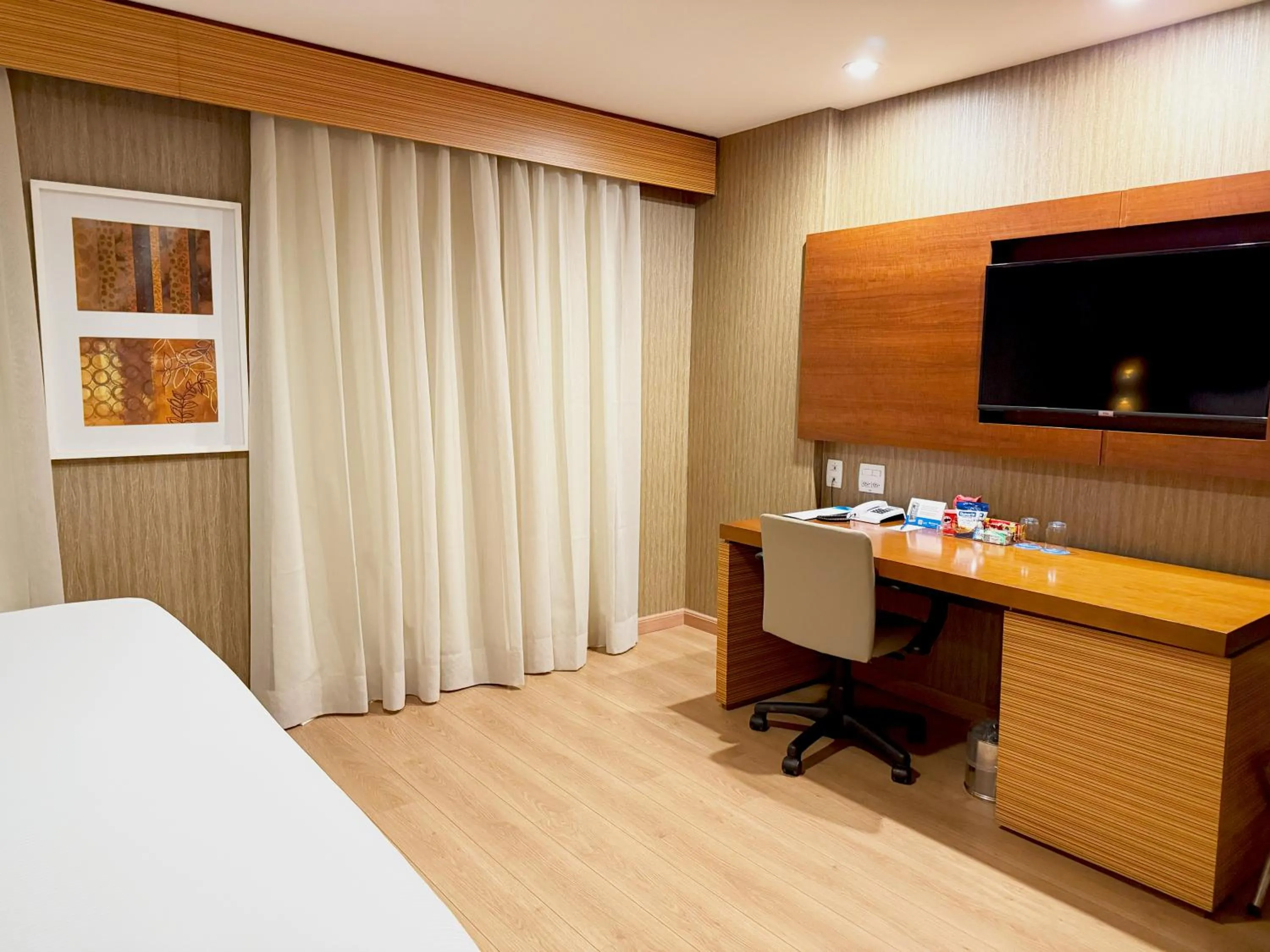 Bed in Wyndham Sao Paulo Ibirapuera Convention Plaza