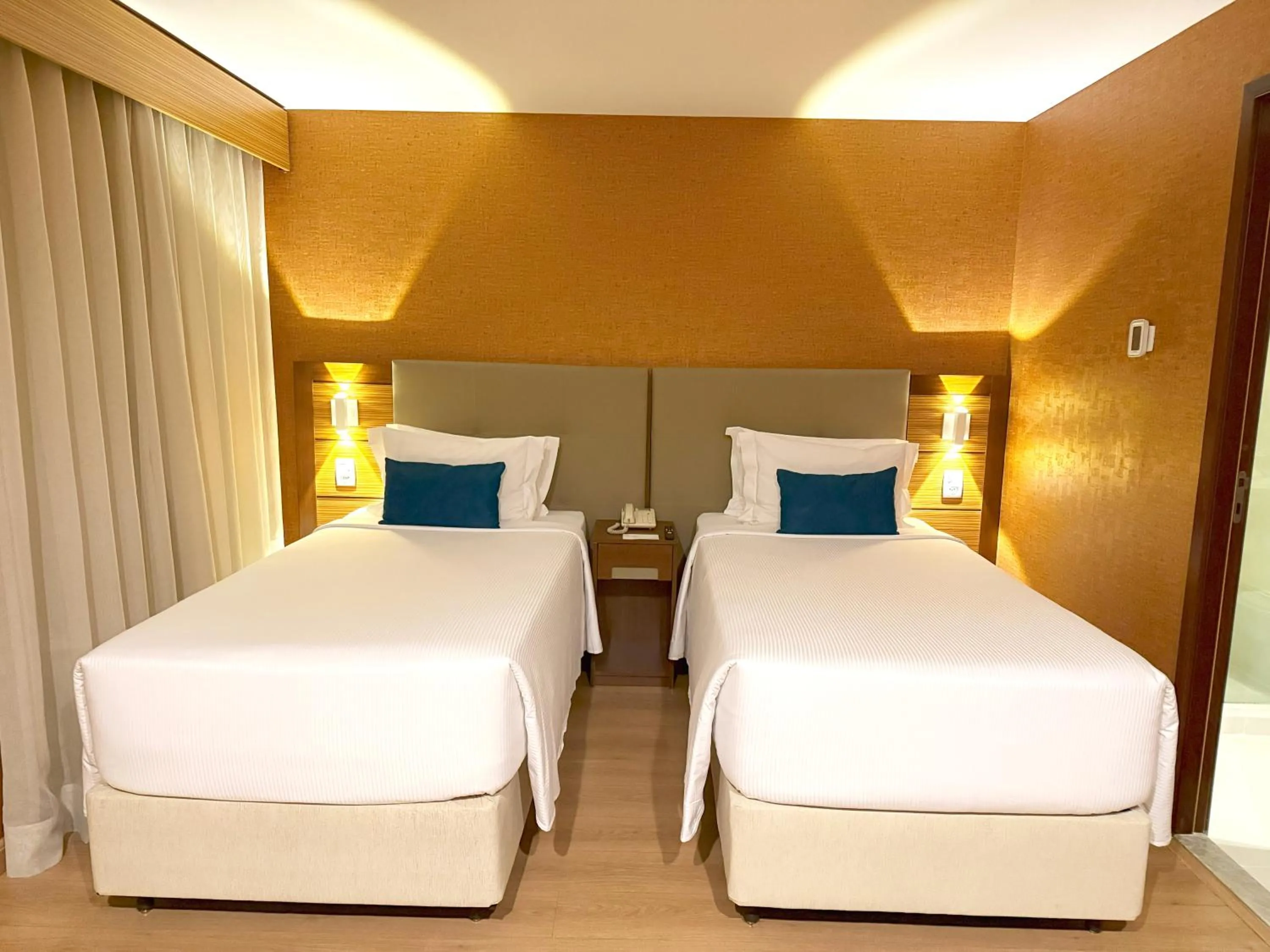 Bed in Wyndham Sao Paulo Ibirapuera Convention Plaza