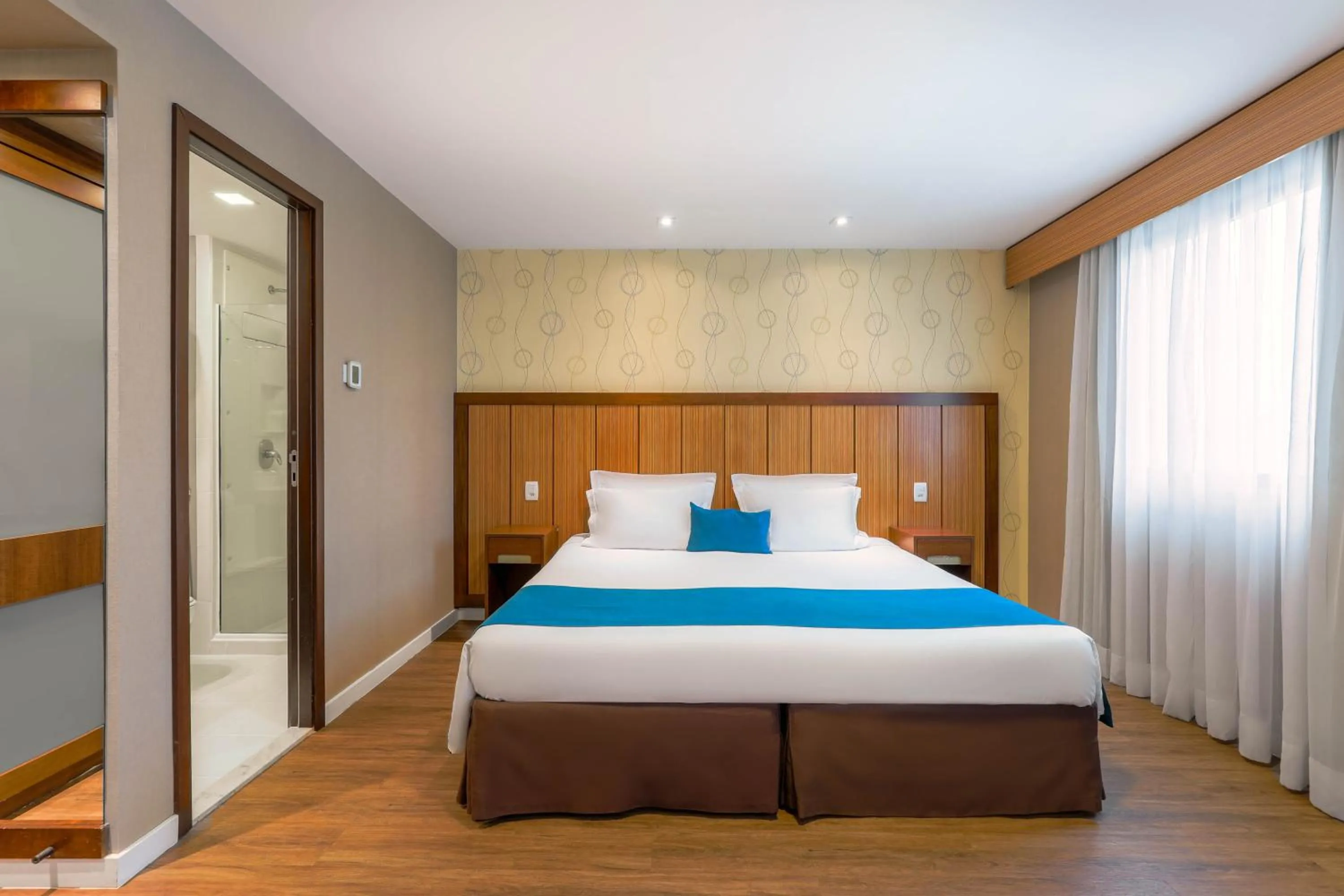 Bed in Wyndham Sao Paulo Ibirapuera Convention Plaza