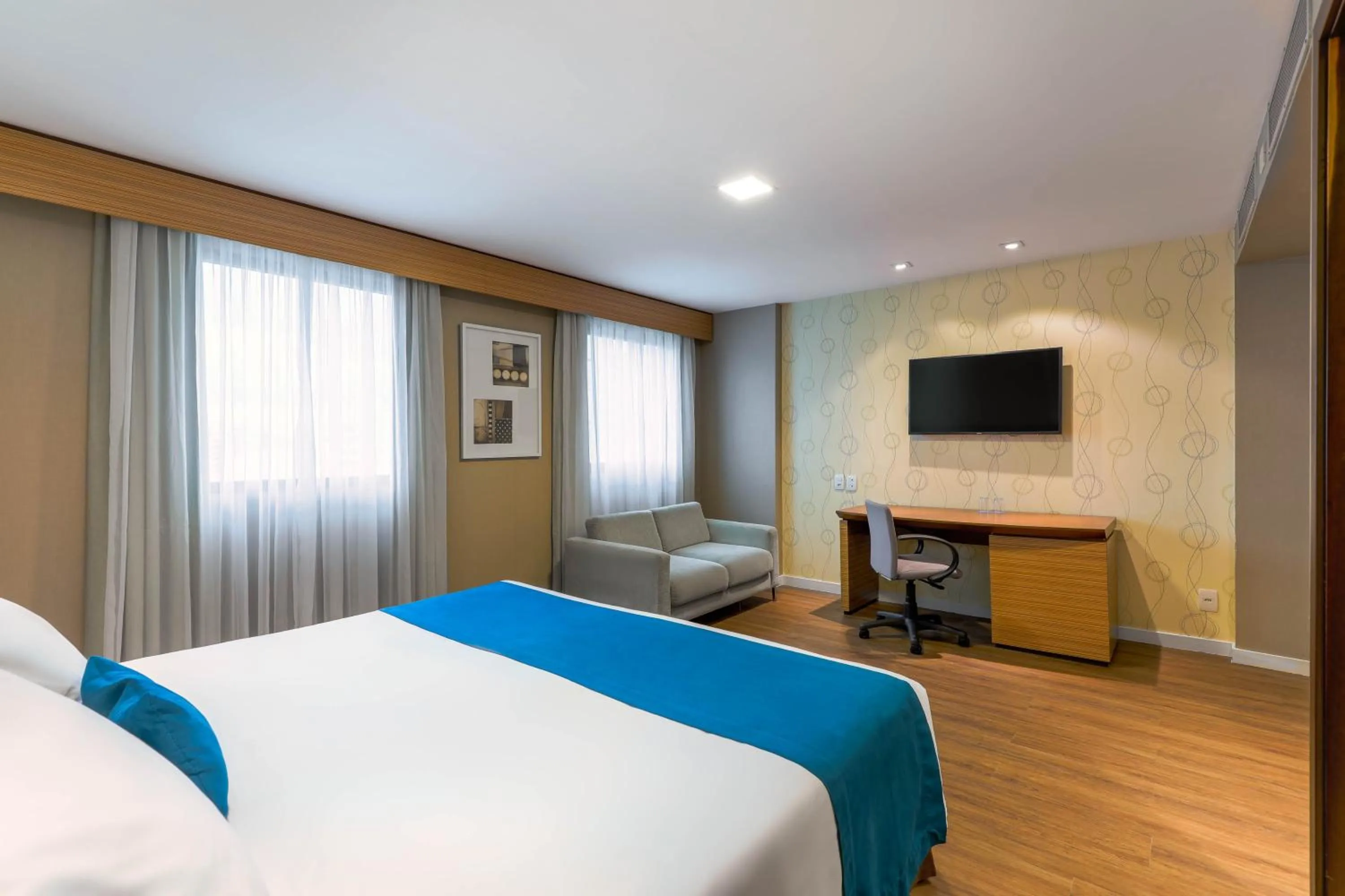 Bed in Wyndham Sao Paulo Ibirapuera Convention Plaza