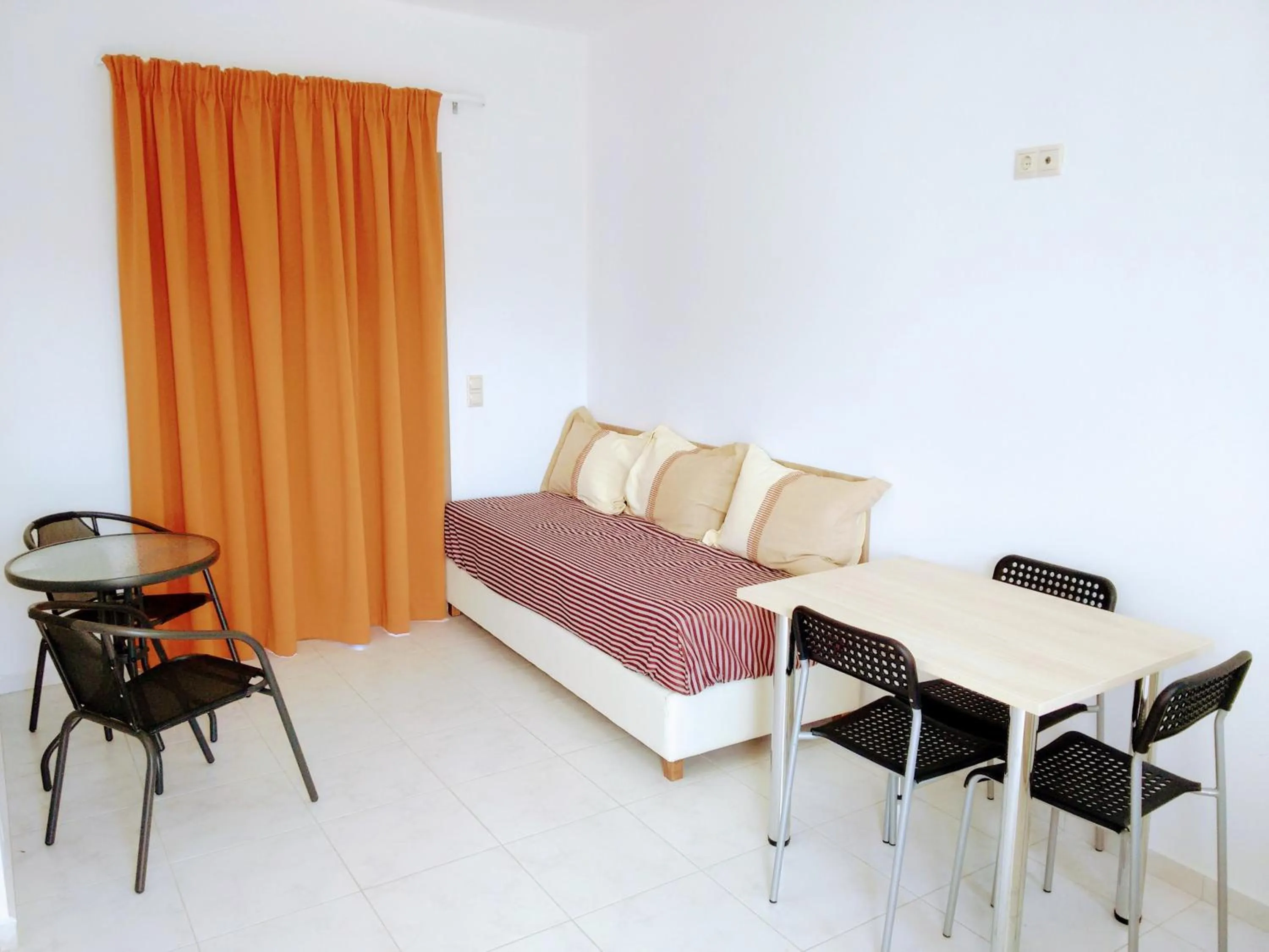 Seating area, Bed in Casa Malena