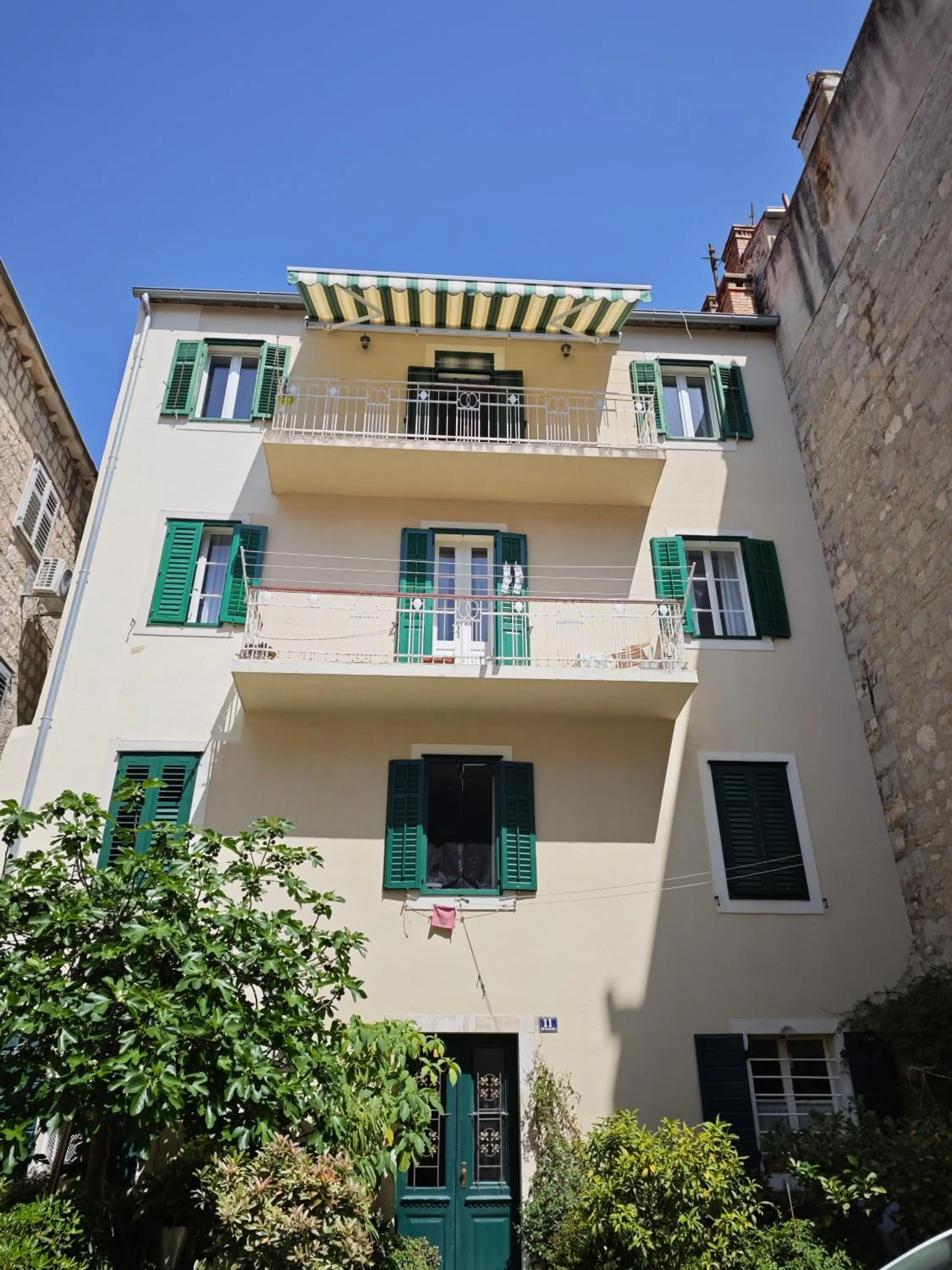 Property building in Apartment Central Old town with private indoor garage parking