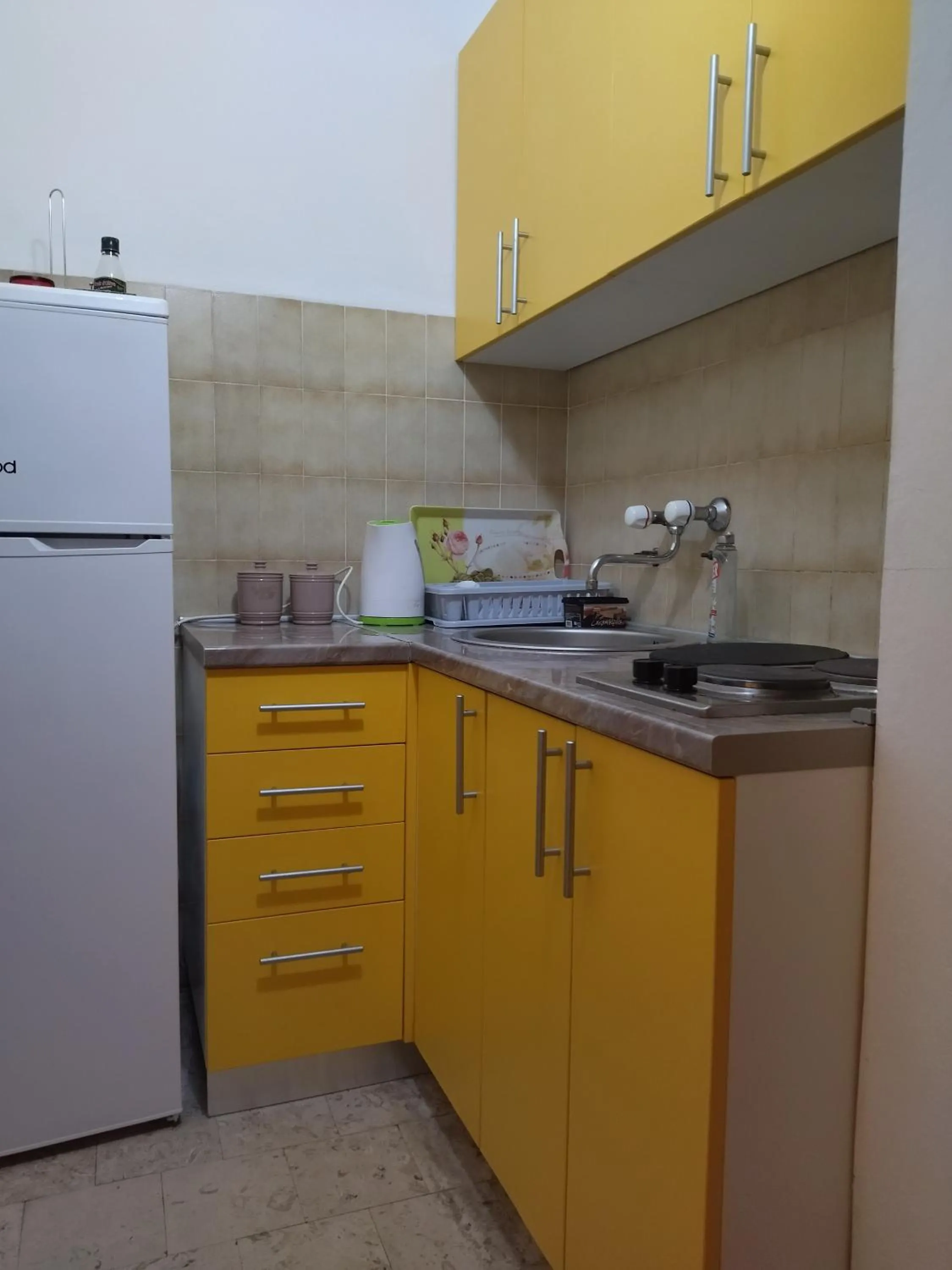 Kitchen or kitchenette in Apartman Bećir