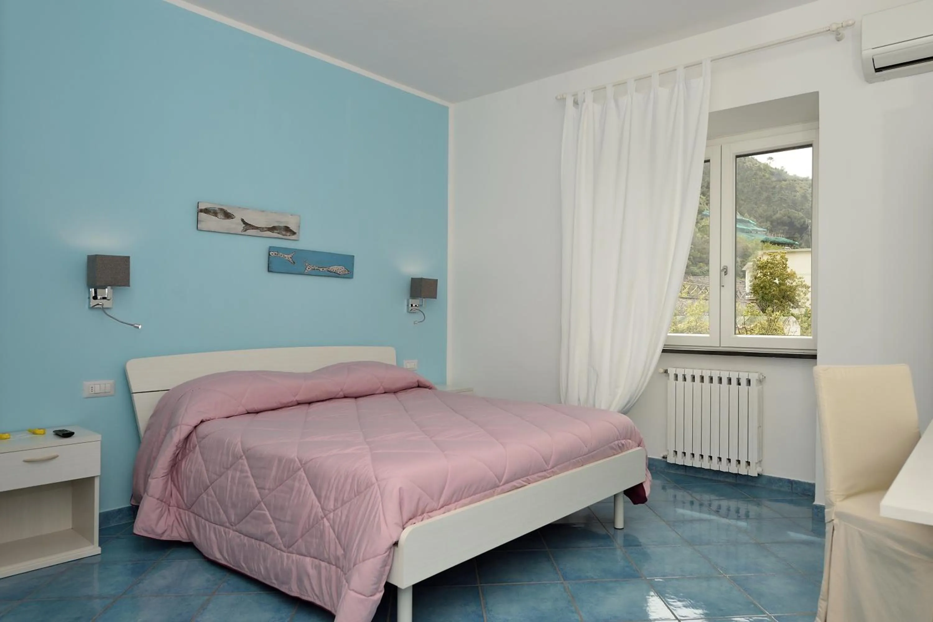 Bed in Aquarius Maiori B&B