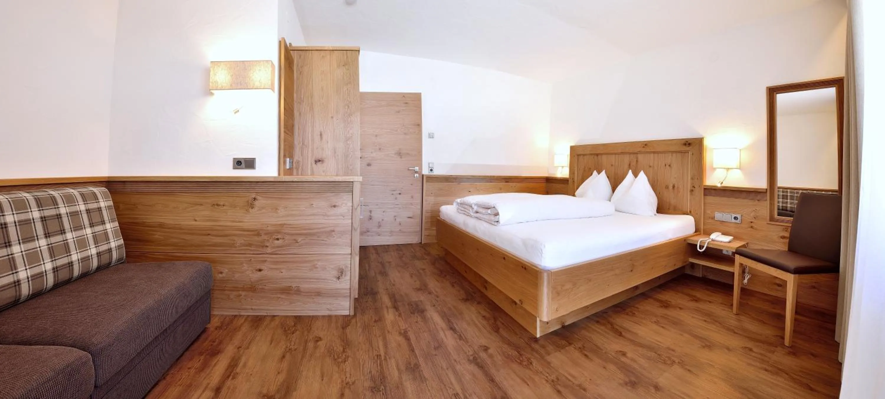 Bed in Aparthotel Garni Monte