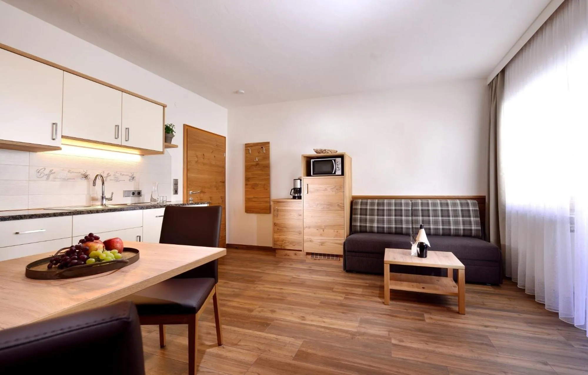 Kitchen or kitchenette in Aparthotel Garni Monte